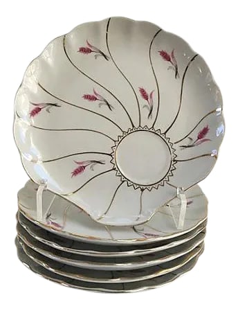 Vintage Shell-Shaped White & Pink Gilt Porcelain Plates - Set of 6: Lovely set of six gilt rimmed shell-shaped porcelain luncheon plates with flowing pink wheat motif and inset for cup holder. Unmarked. Condition: Alterations: Original Condition Unaltered