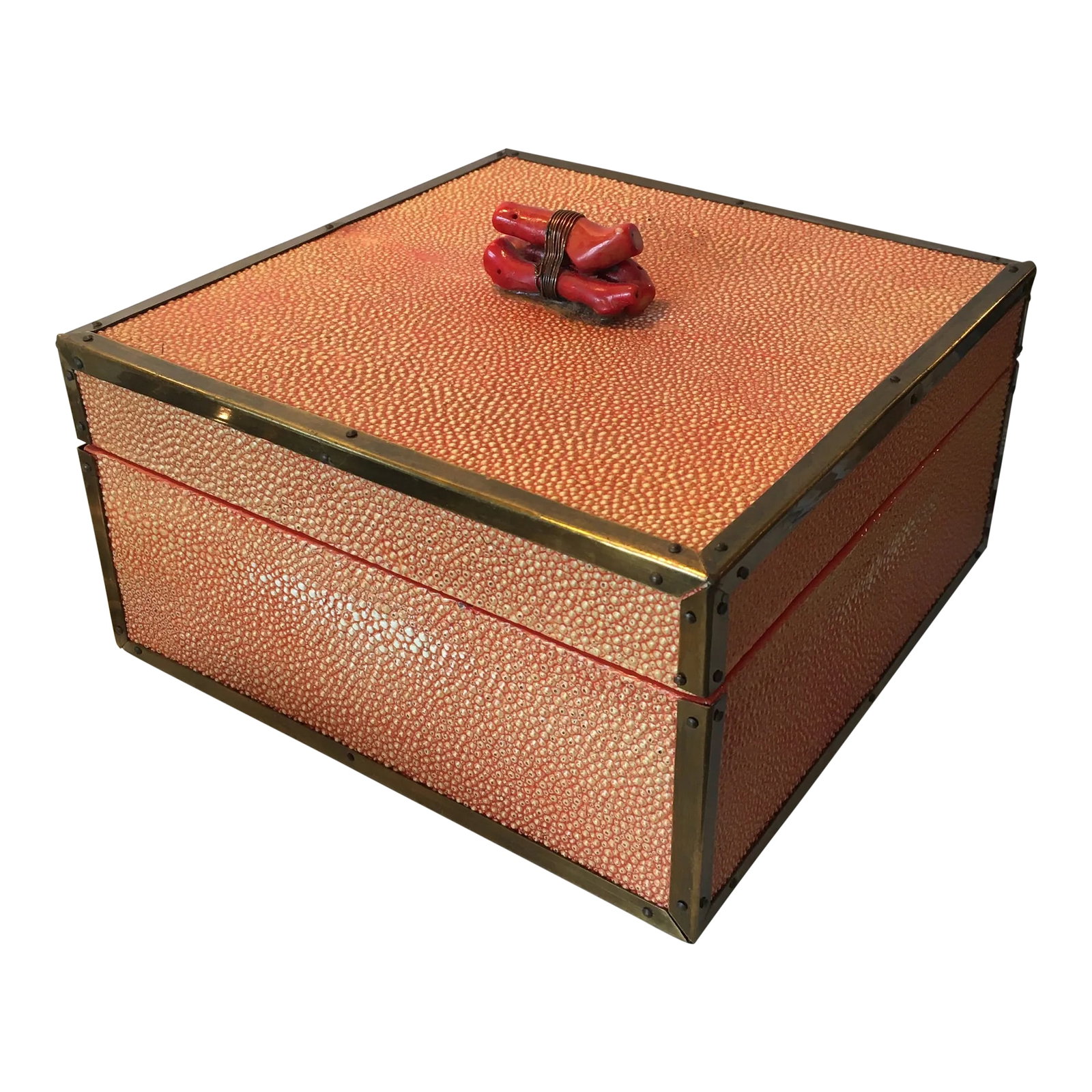 Coral - Colored Shagreen Lidded Box With Metal Wrapped Coral Lid Pull: Beautiful coral colored shagreen box. The lid has a piece of real coral wrapped in wire. This box has brass surrounding top and bottom edges with tiny brass nails to hold in place. The interior is