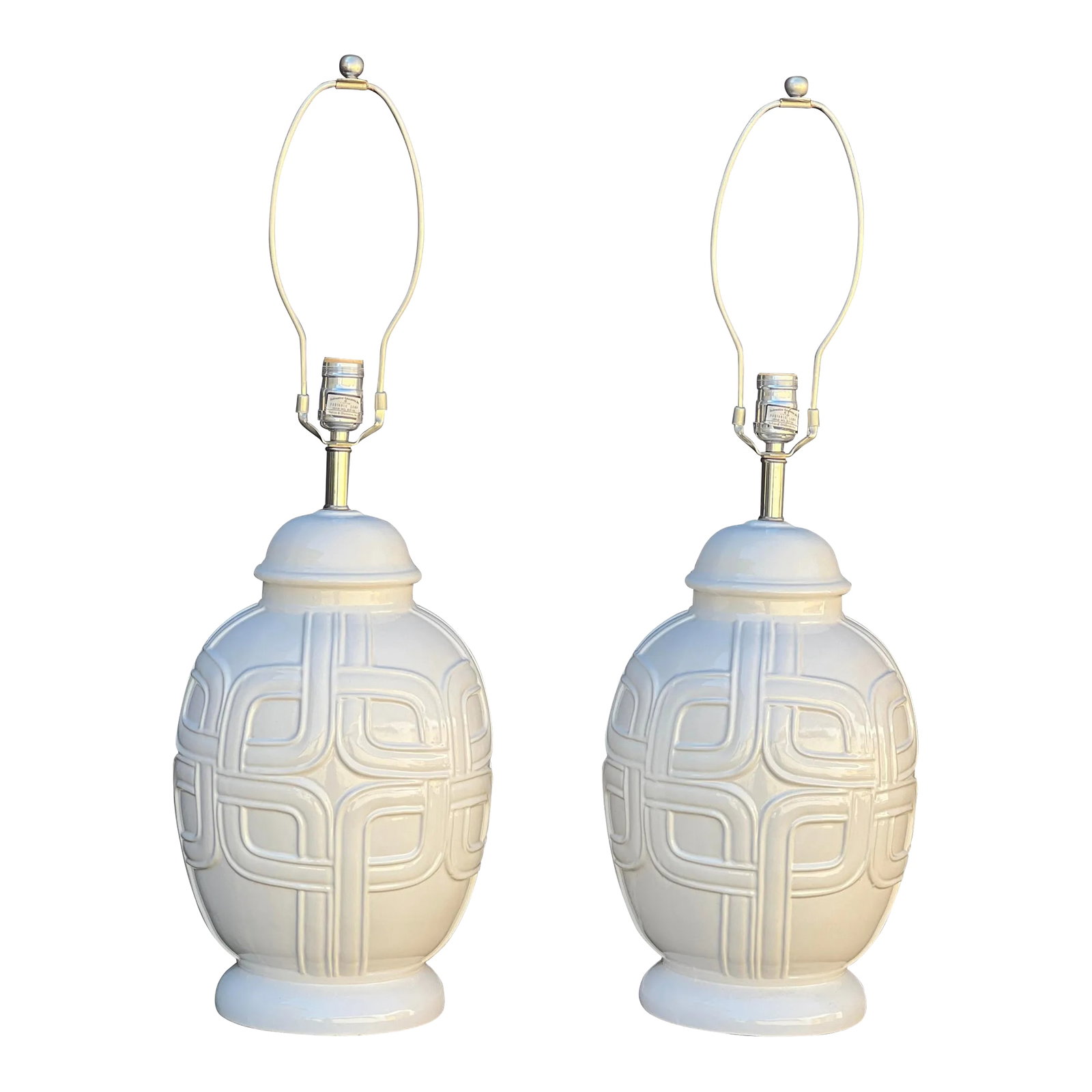 Mid-Century Ceramic Table Lamps, Pair: Mid-Century White Ceramic Table Lamps, No cracks or scratches , 16 1/2 "w x 21" Height to top of socket, 30" with the harp on. Condition: Alterations: Original Condition Unaltered Imperfections: Some