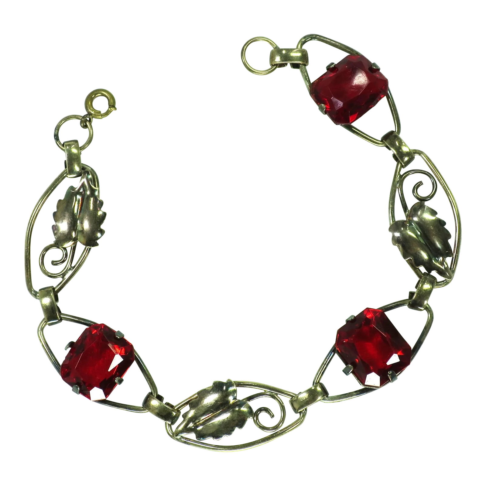 Vintage 1930s Art Deco Sterling 12k Ruby Crystal Bracelet: This is part of Chairish's Costume Jewelry assortment. 1930s Art Deco 12k gold over sterling link bracelet. This delicate offering presents open elliptical links with smooth connectors, alternating