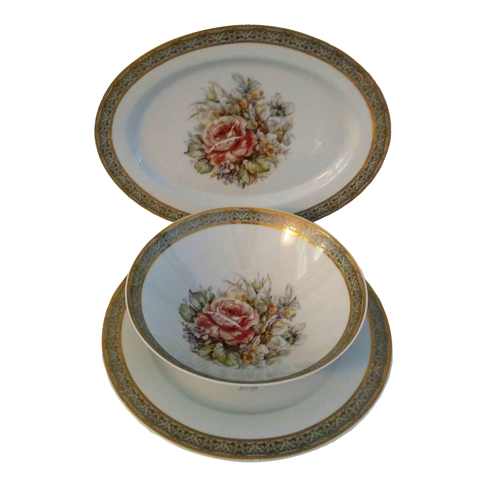 Vintage T. Limoges Italy 24k Gold Floral Serving Pieces, Set of 3: Gorgeous set of three Dal 1969 T. Limoges premium porcelain serving pieces featuring a delicate floral motif in center with ornate 24 karat gold embellished wide band rims. Set consists of one