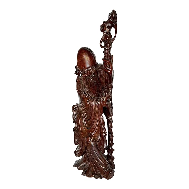 Chinese Rosewood Sculpture of Daoist Deity: Chinese carved rosewood sculpture of a Daoist deity measuring 36 inches tall. Condition: Alterations: Original Design Modified Imperfections: Some Imperfections Condition Notes: Good Repaired: With