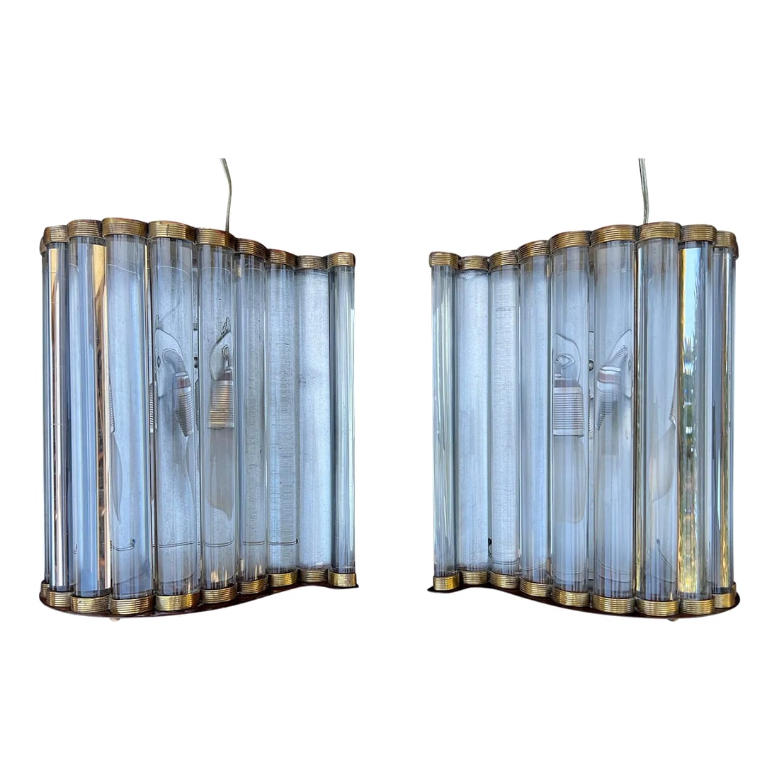 Pair 1940's Murano Glass and Brass Wall Sconces.: Pair 1940's Murano glass and brass wall sconces 11 clear rosds semicircular on a brass ringed base with two candelabra style lights ,rewired to fit U.S lighting standard. Condition: Alterations: Origi