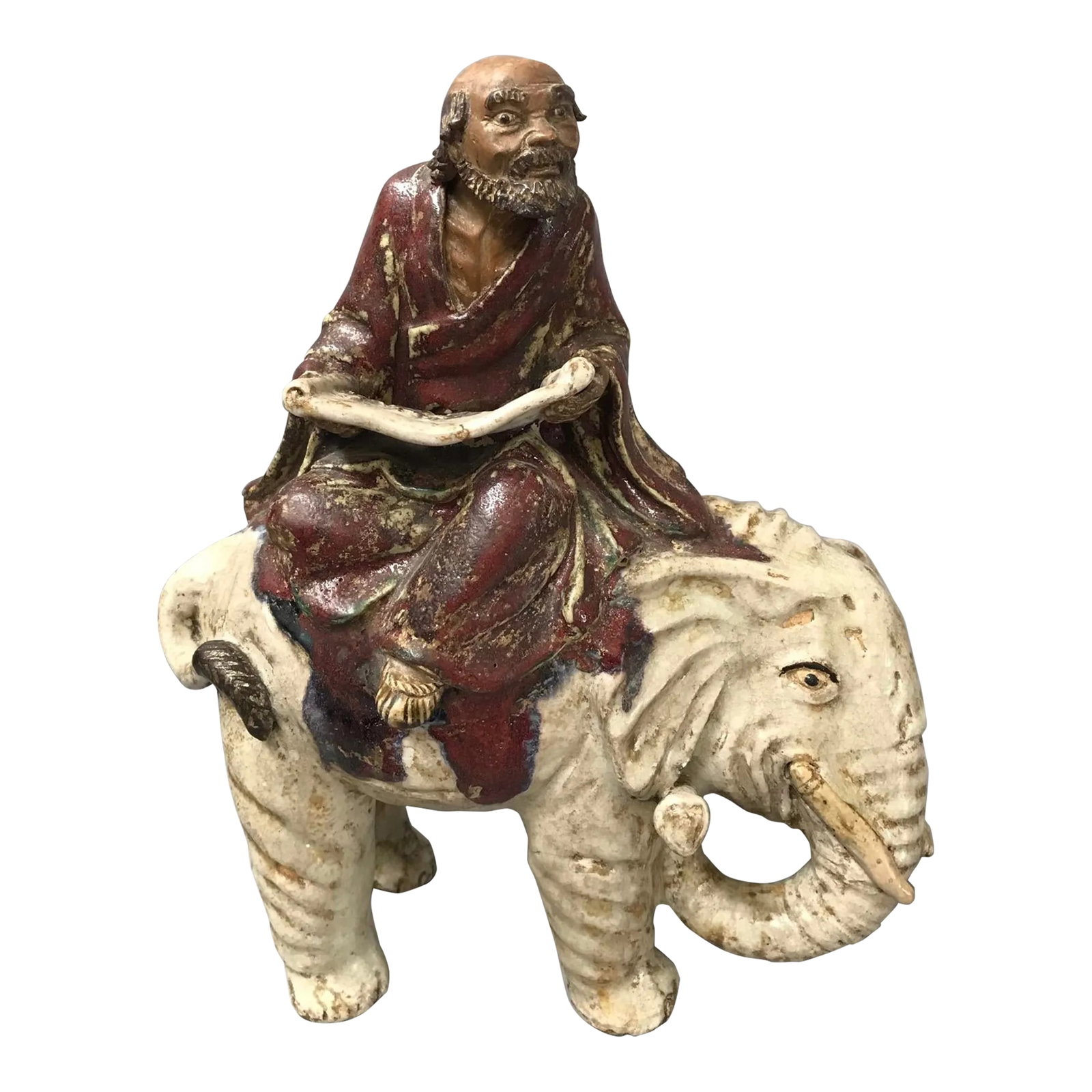 Early 1900s Antique Shiwan Lohan on an Elephant: There is a lot to be said about Shiwan wares, one of the more misunderstood Chinese pottery art. People north of the Guangdong province, the southernmost province of China are not familiar with the