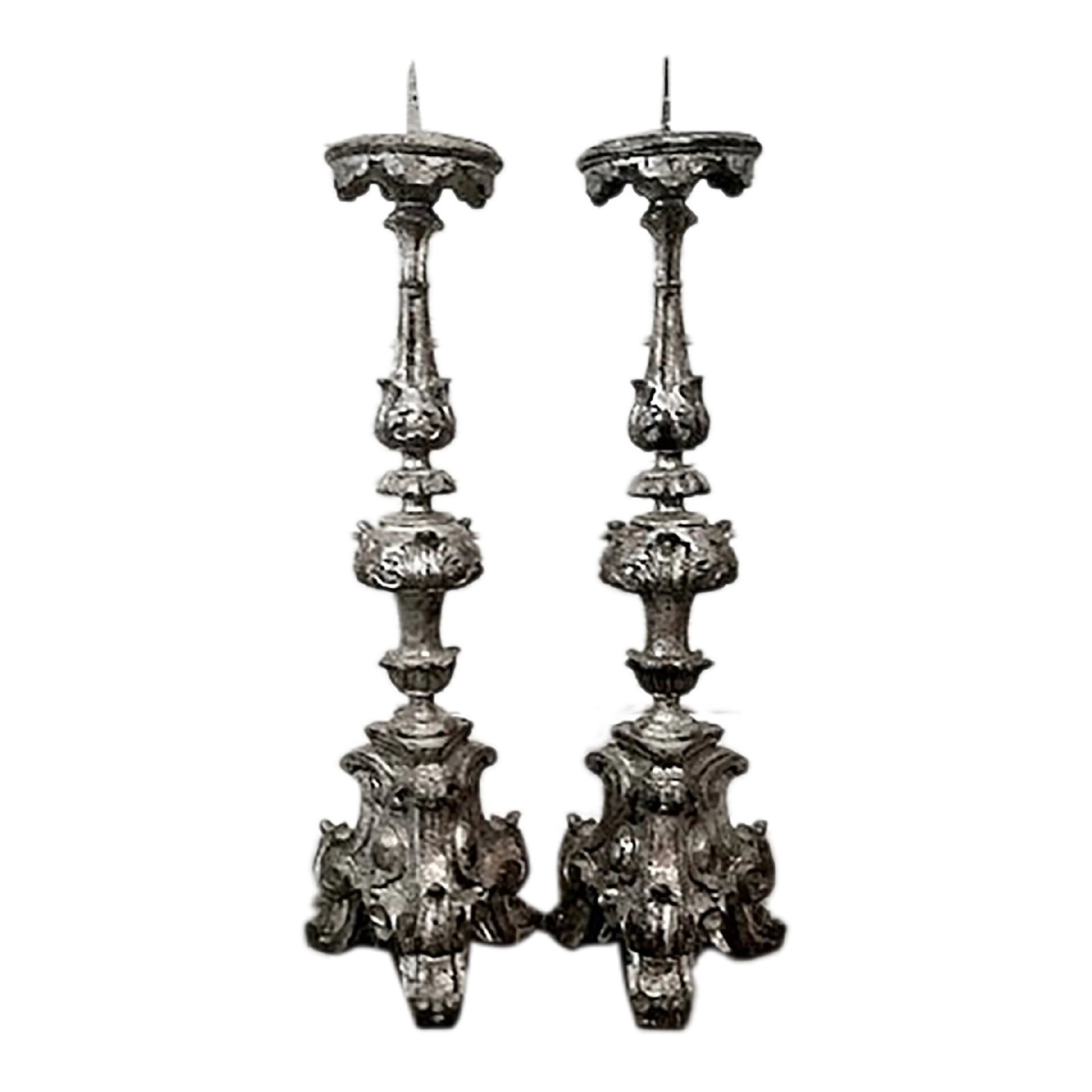 Early 18th Century Pricket Candlesticks Madame Et Monsieur- a Pair: Outstanding Early 18th century, Italian carved wooden and silver leaf Candle Sticks. Madame et Monsieur prickets with circular tops, carved applied putti decoration and scrolled feet. Beautifully worn