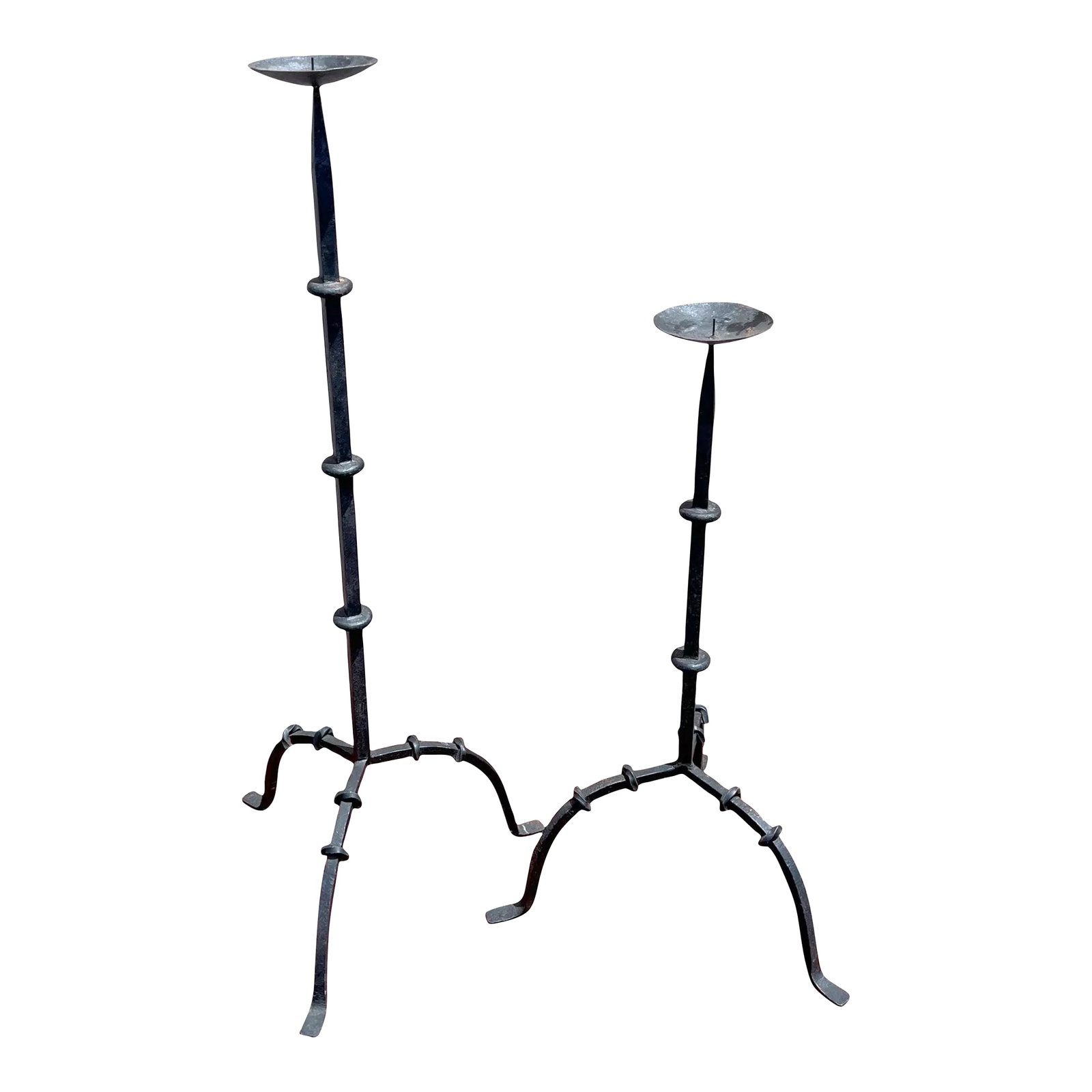 Antique Handwrought Iron Candle Stands - A Pair: A wonderful pair of Antique 19th Century French style hand forged iron candle stands. They put off a statement with their simple design. C. 19th century Tall measures: 41" tall x 17" circumference at