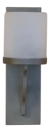 Casella Lighting Baca Sconce Showroom Sample: The Baca Sconce from Casella Lighting has a weathered nickel finish. It has been a part of a showroom display and is in excellent condition. Condition: Imperfections: No Imperfections Condition