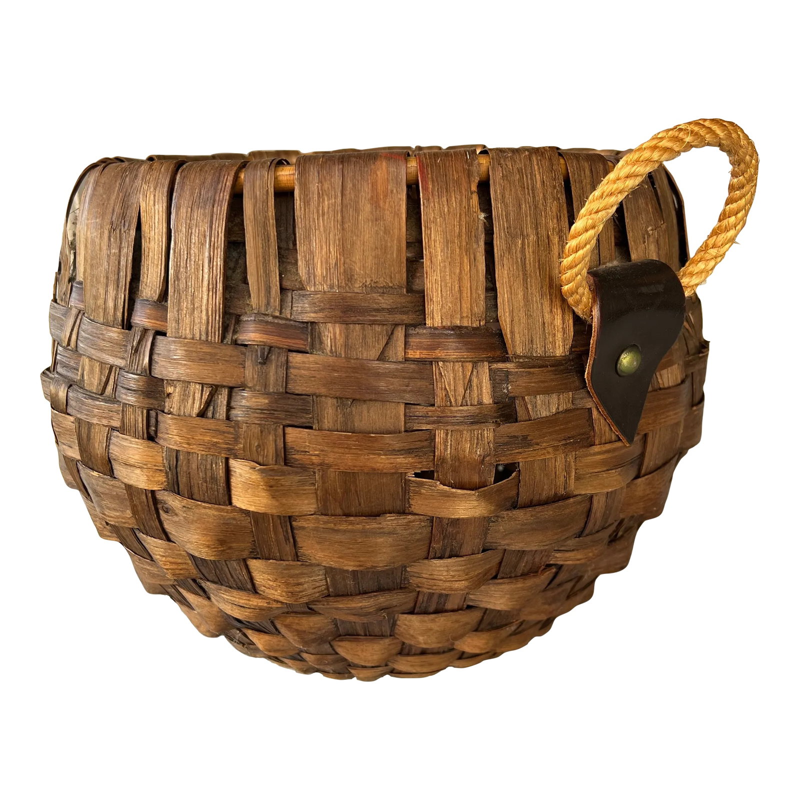 Mid 20th Century Mid Century Round Bentwood Basket Handmade in Italy: The vintage basket features rounded woven body. The basket is equipped with a rope handle attached by leather tabs and metal rivets. The handle of a rope measuring a 3" loop. The top is reinforced wit