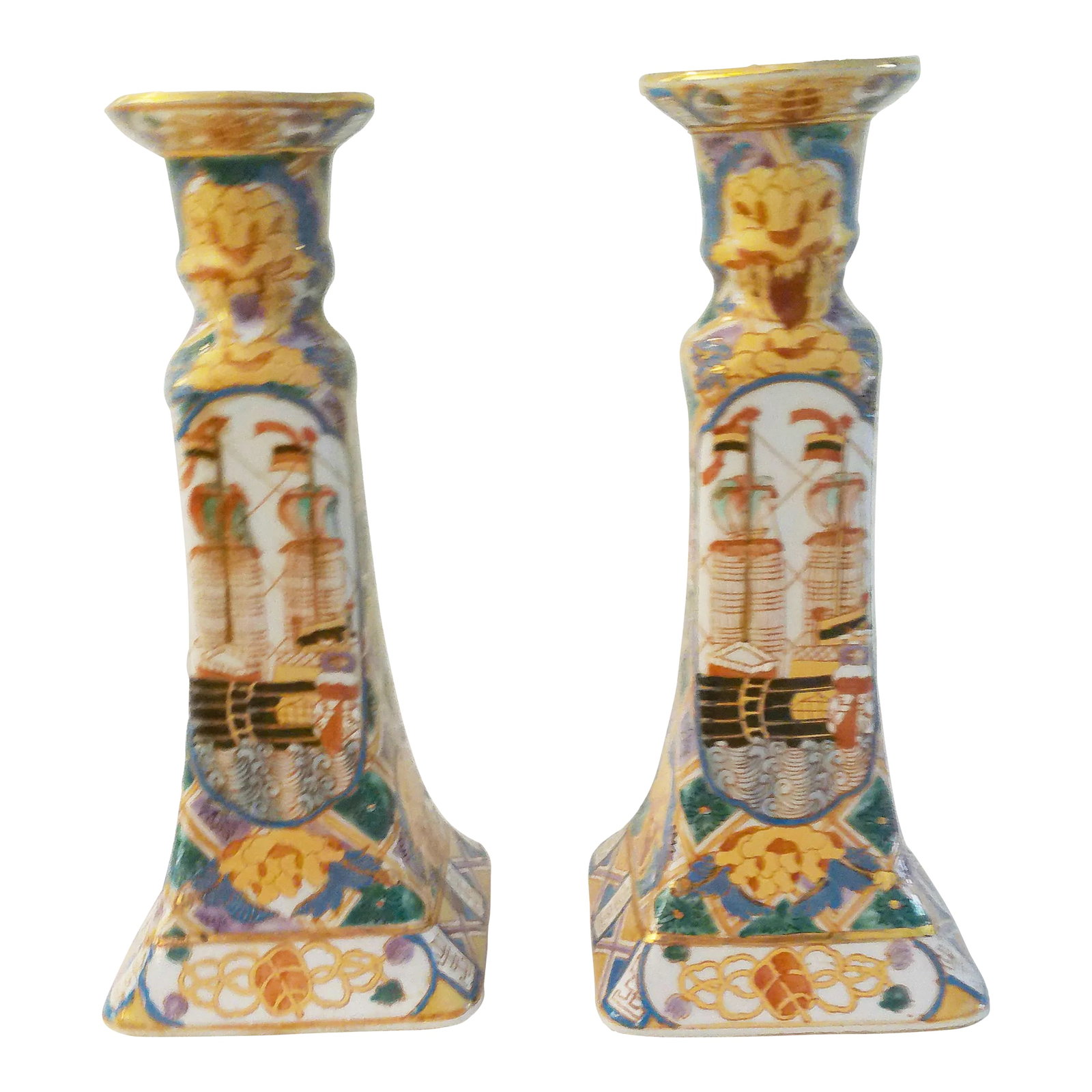 Vintage Chinese Botanical Ship Porcelain Candle Holders, a Pair: Gorgeous pair of vintage Chinese porcelain candle holders hand-painted in vibrant multicolor shades with gold accents. Candle holders feature an all over botanical motif. Panels depict image of ship,