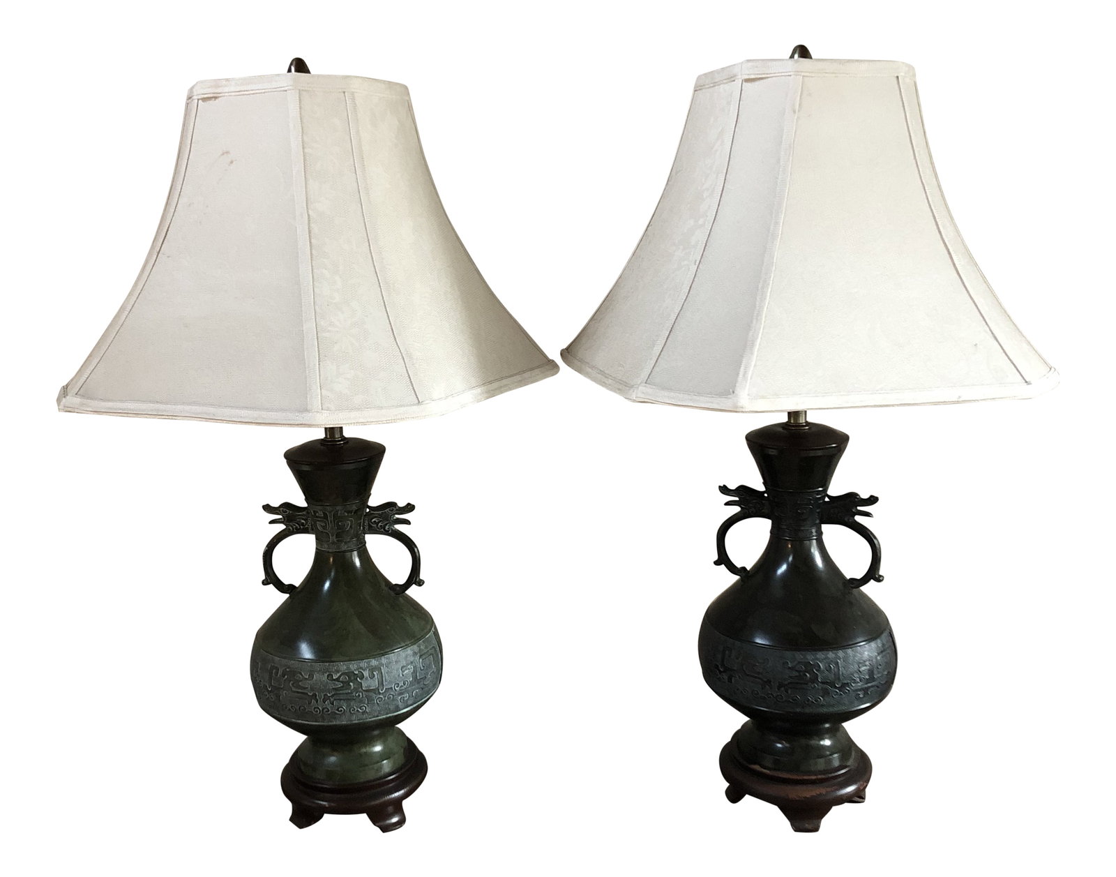Vintage Mid-Century Chinese Bronze Marbro Lamps - a Pair: Hollywood Regency style beautiful and vintage bronze table lamps in the form of a Chinese archaic vase on a wood base. Marbro Mid Century with dragon handles. Beautifully detailed decoration