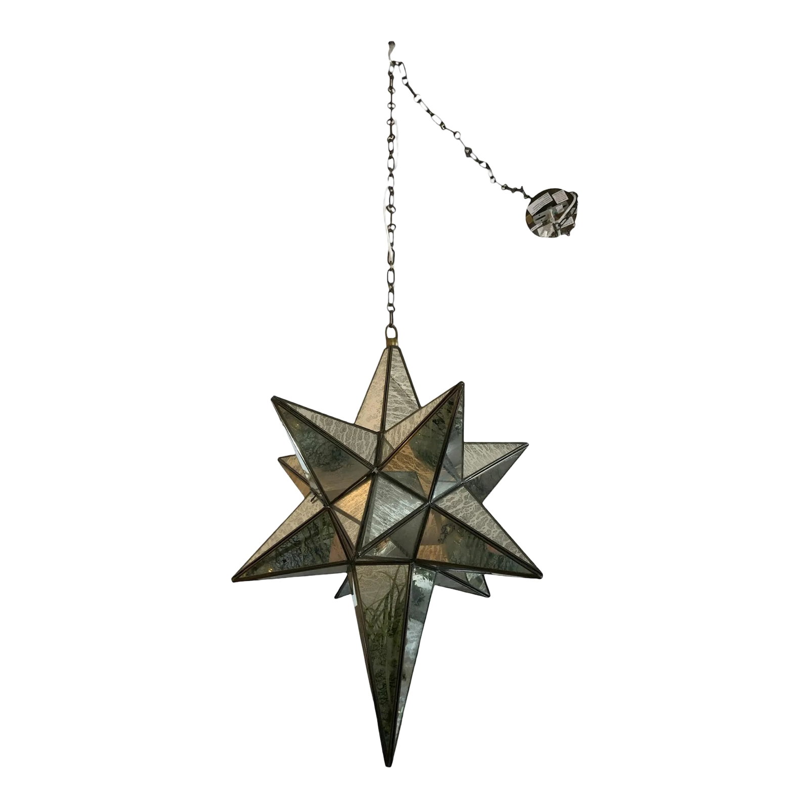 Merrill Antique Brushed Brass Pendant: The Merrill Antique Brushed Brass Pendant by Gabby brings updated styling to the timeless Moravian star design with an eye-catching elongated presentation that adds drama to the ceiling. Crafted from