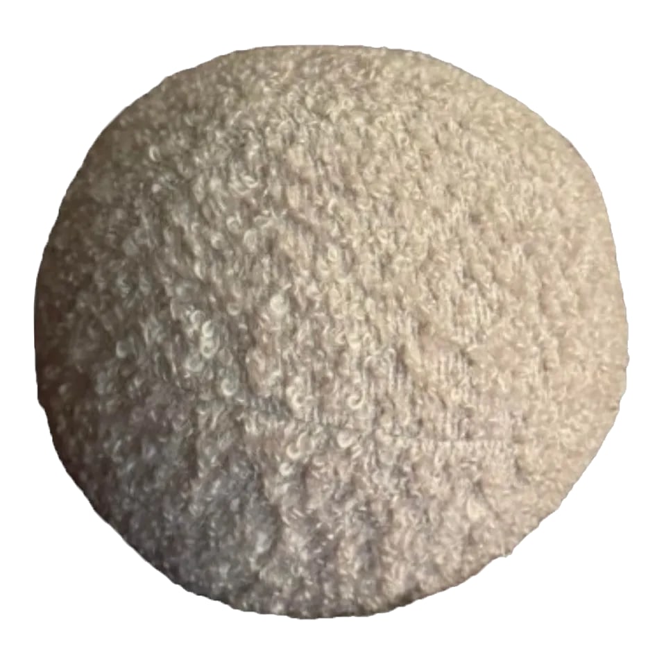 Zak and Fox Boucle Round Pillow: The Zak and Fox Boucle Round Pillow is a stunning blend of comfort and elegance, designed to elevate any living space. Made from wool boucle fabric, its textured surface adds a touch of warmth and