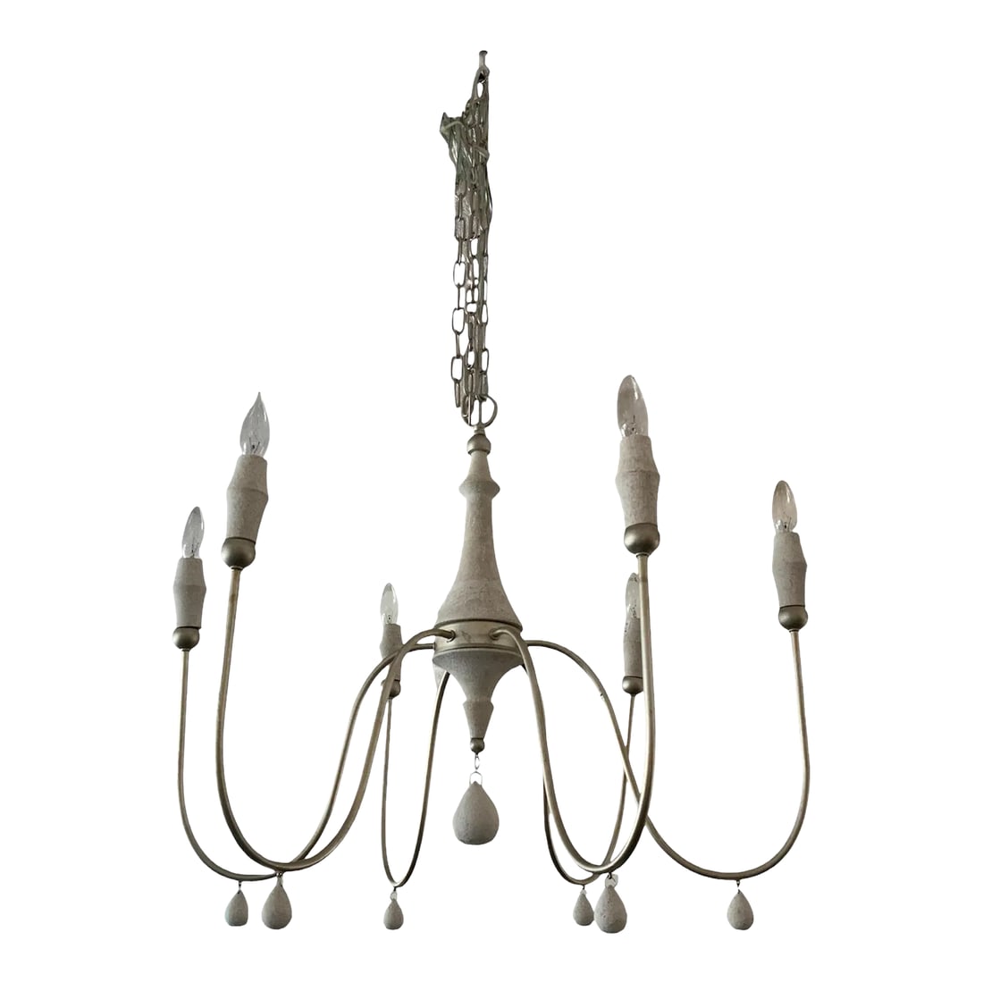 Clay Chandelier: This transitional showstopping chandelier gathers inspiration from antique style fixtures with a turned wood center column. Our Clay Chandelier features eight silver arms creating a transitional