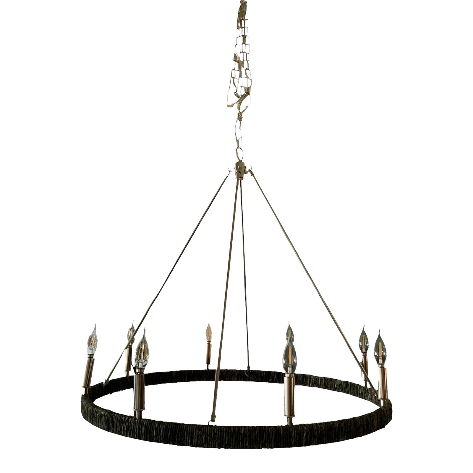 Polished Nickel 8 Light Chandelier: Illuminate your home with the chic elegance of this polished nickel 8-light chandelier, featuring a distinctive lack rattan bottom rim. This stunning piece blends modern sophistication with a touch