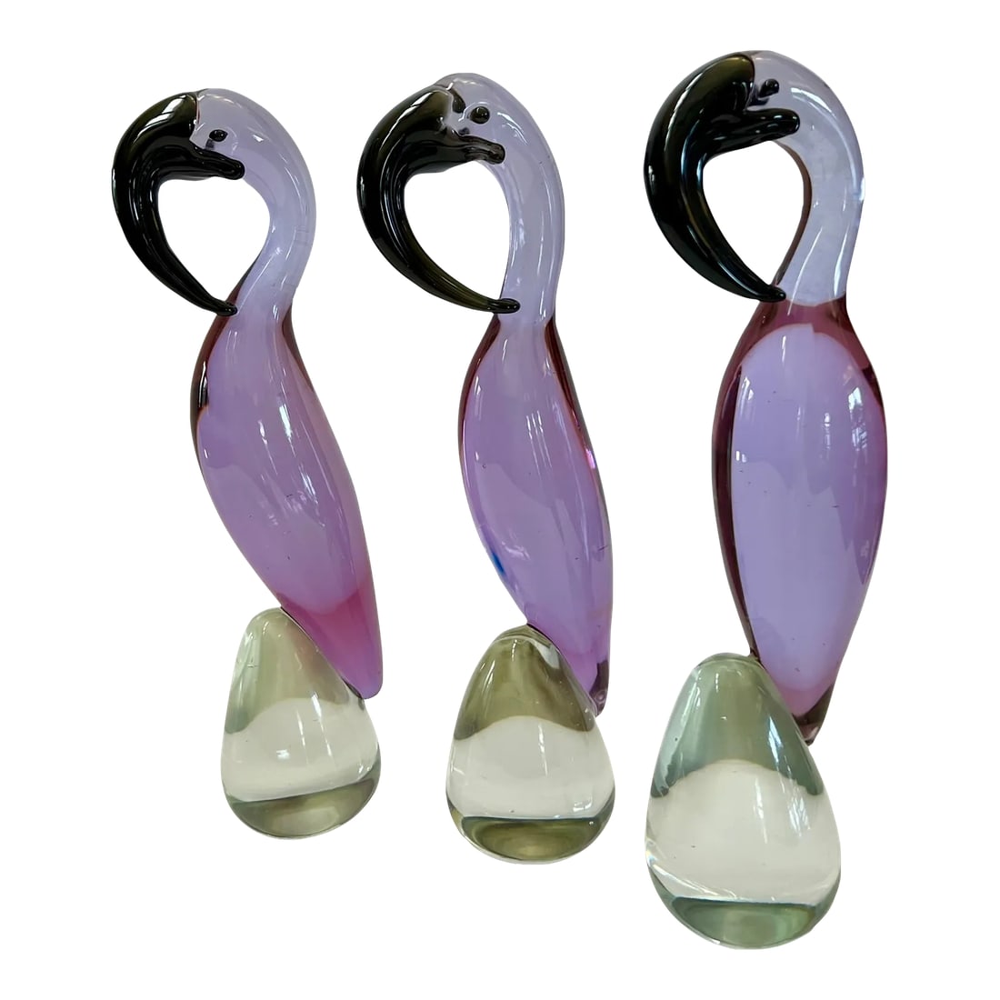 Set of Three Vintage Lavendar Glass Flamingos in Murano Style: Three lively flamingos, hand blown by glass artists in the style of Murano Glass animal sculptures. From my own experience at a Murano glass factory on the island of Murano across from Venice, Italy,