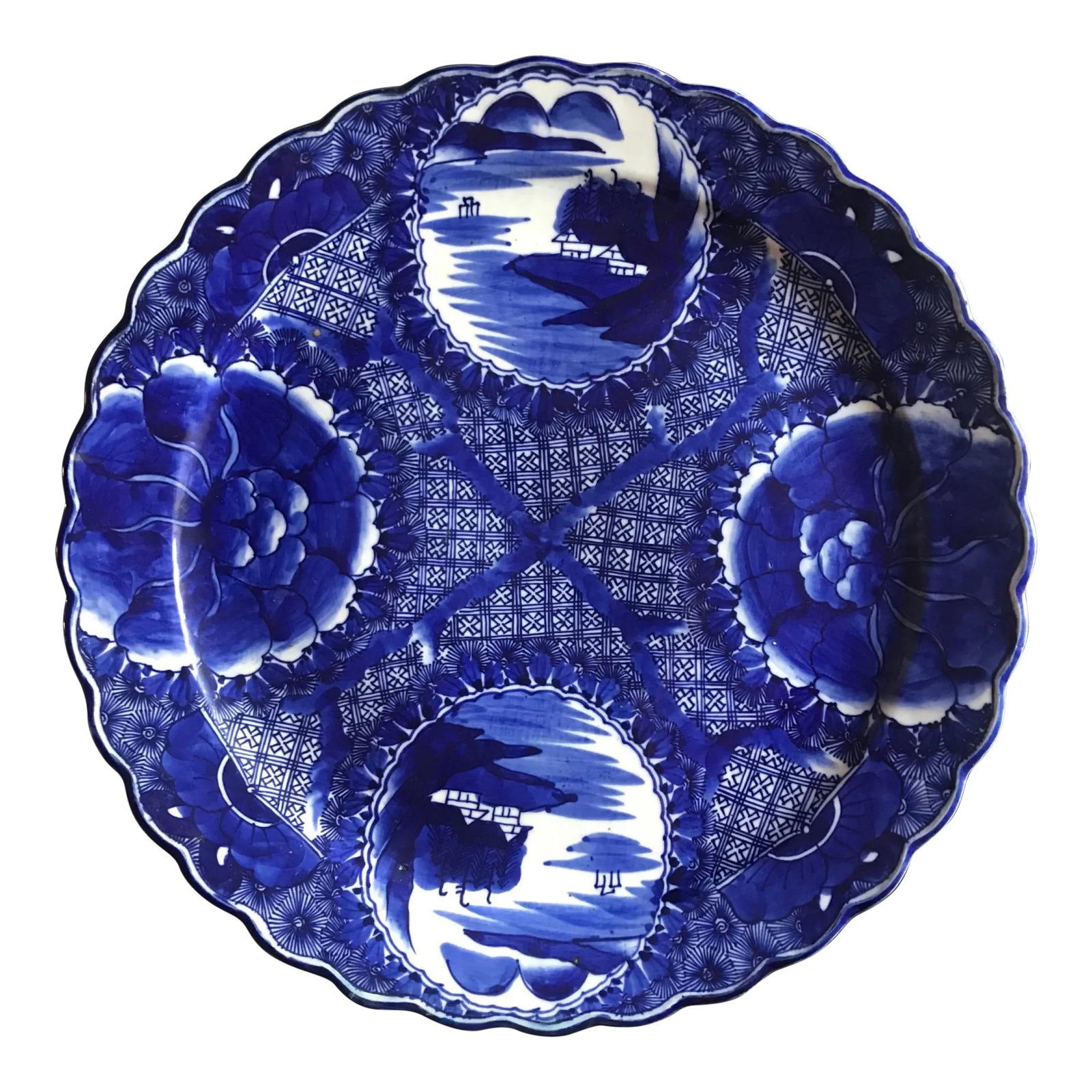 18th Century Imari Blue and White Round Scalloped Japanese Oversized Platter: 18th Century Imari Blue and White Round Scalloped Japanese Oversized Platter This large, beautiful and bold blue and white platter is Japanese Imari from the Edo period (18th Century). This