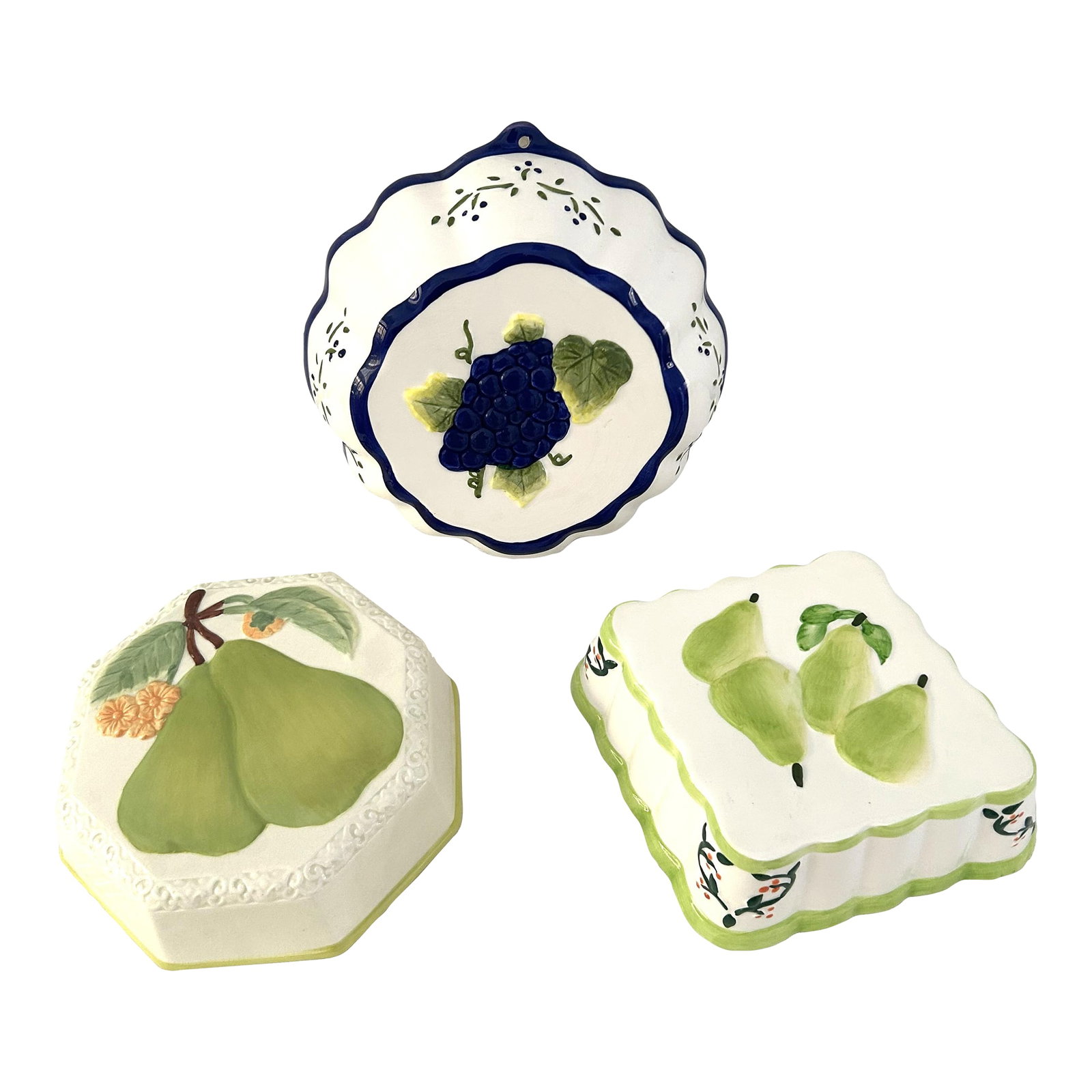 Vintage Hanging Kitchen Molds, Set of 3: Charming set of three hand-painted ceramic hanging kitchen molds. Set consists of one octagon shaped pear mold, (7"Dia x 2"W), one grape cluster mold, (8.5"Dia x 3"H), and one square shaped pear