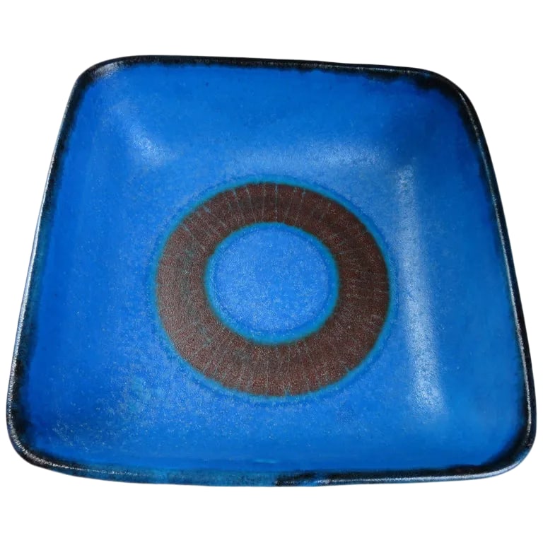 Guido Gambone Bowl: Stunning color and design! A rich cobalt blue, with brown circle in center of bowl. Generous square shape. Good presence. Condition: Alterations: Unknown Imperfections: Some Imperfections Condition