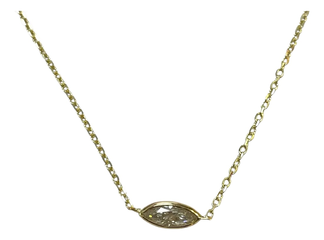 Classic 14k Yellow Gold 0.55ct Marquise Natural Diamond Bezeled Necklace: A classic masterpiece, this 0.55ct natural marquise-cut diamond is bezel-set in 14K yellow gold, exuding understated elegance. With an adjustable 16-18 inch chain, it's the perfect blend of timeless
