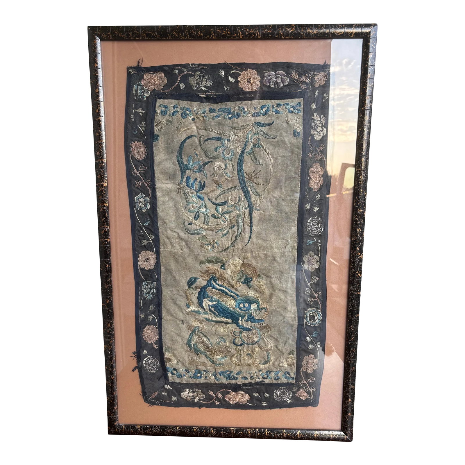 Vintage Embroidered Chinese Dragon Silk Tapestry Textile Art in Tortoise Frame: Wonderful vintage, possibly antique, Chinese silk tapestry sewn in muted shades of blue, greens, gold and cream with a striking black border. Gorgeous detailing and beautifully framed in a thin