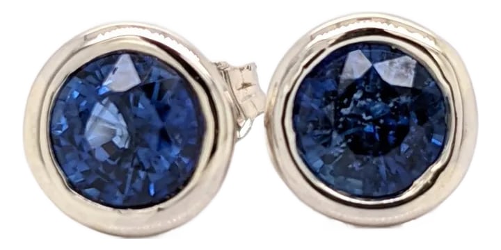 Blue Sapphire Bezel Set Solitaire Stud Earrings in Solid 14k Gold Round - 2 Pieces: These simple studs are quite a statement with the deep rich blues of the sapphire. Made to be worn every day with safe and secure push back closures! Let us know the gold color you would prefer.