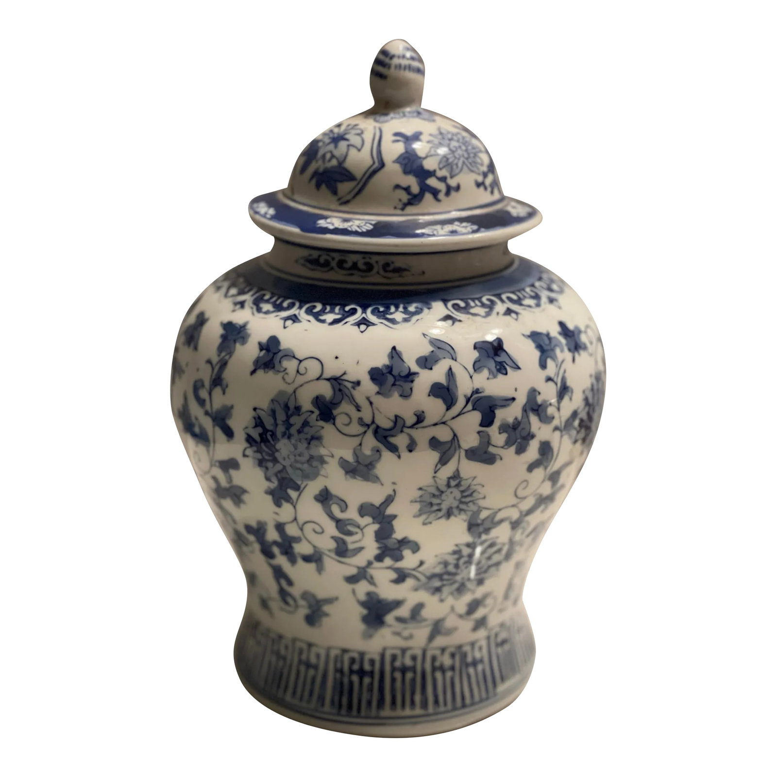 Late 20th Century Chinese Blue & White Porcelain Ginger Jar, Stamped: Beautiful porcelain ginger or tea pot. Decorative pot that can be used as a storage pot or as a flower vase. Blue flower pattern. Generous size. Stamped. Measurements: Height: 11in (with lid). Diamete
