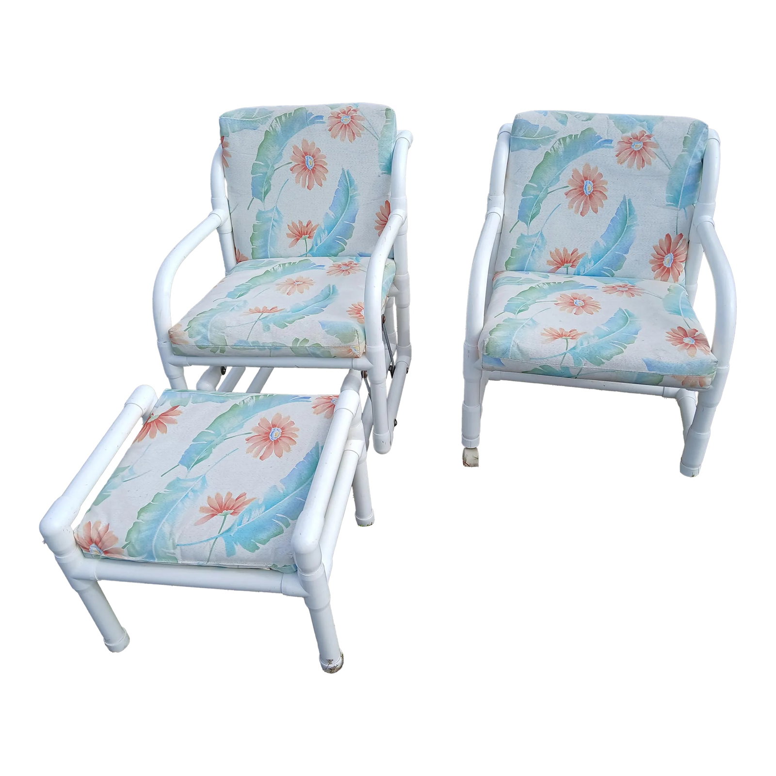 Vintage 1980s Floral Cushions PVC Garden Seating & Ottoman, 3 Pieces: 1980s PVC patio or garden set. A glider, rolling chair, and ottoman. Original water resistant bright Floral cushions. Cushions are still plump and comfortable. Some age related wear, but in amazingly