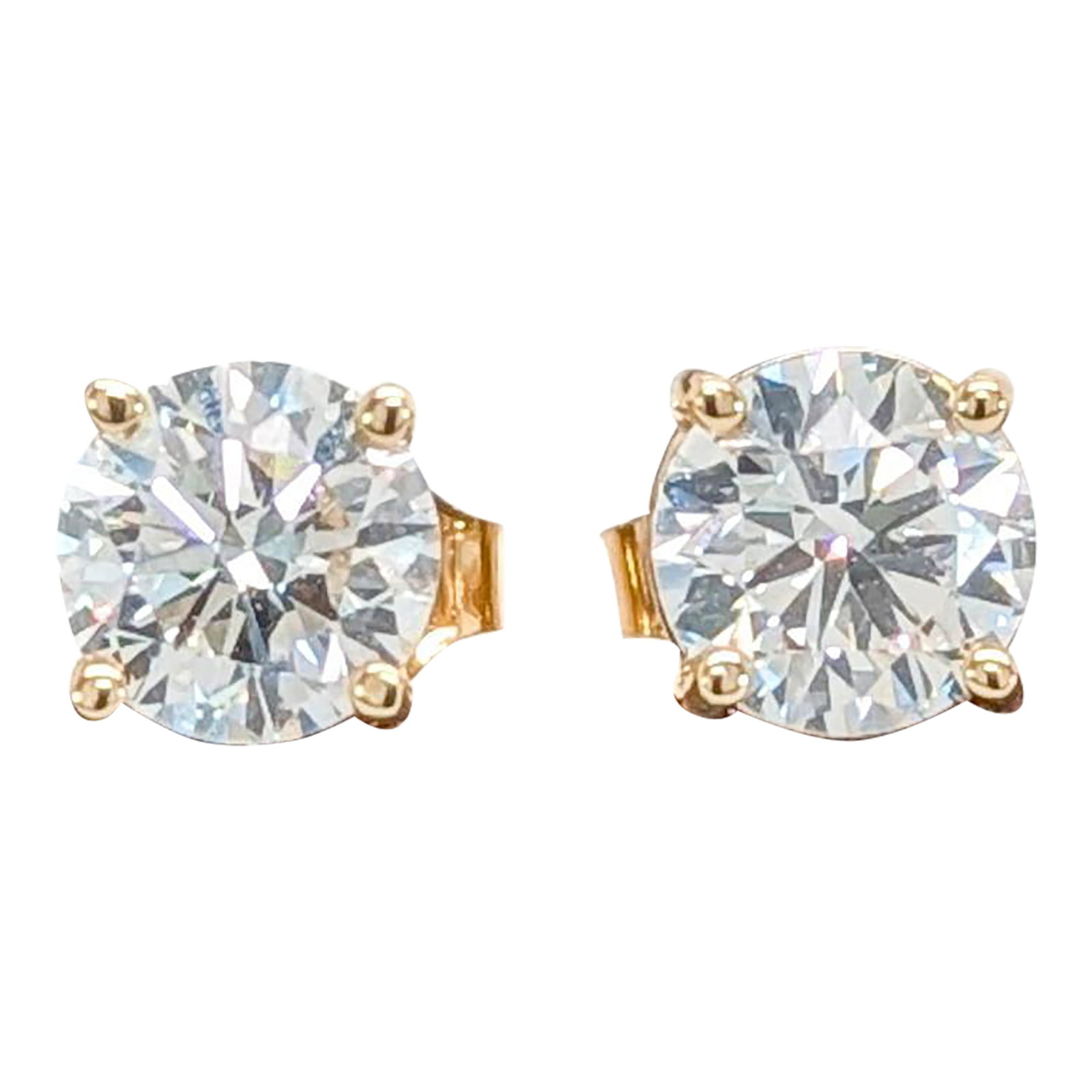 1.66cts Lab Diamond Solitaire Stud Earrings in 14k Yellow Gold | Round 6mm, A Pair: An elegant stud earrings featuring 14K yellow gold settings with lab-grown diamonds. Each earring is set with a 6mm round diamond, making the total carat weight 1.66cts. These solitaire earrings are