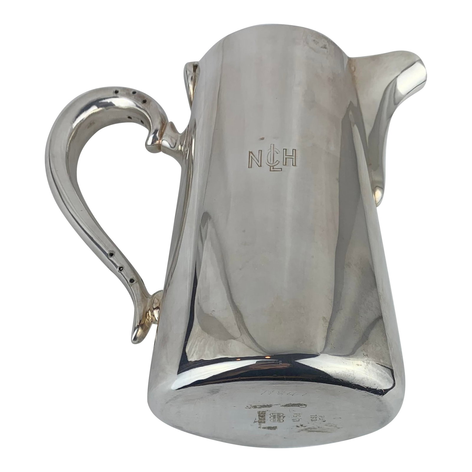 Vintage Plated Silver Pitcher: Vintage plated silver pitcher used for hot milk or water jug. Monogramed NCH. Condition: Alterations: Original Condition Unaltered Imperfections: Some Imperfections Condition Notes: Like New Origin: U