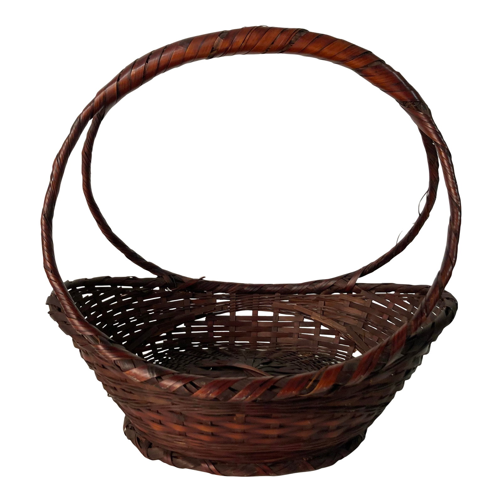 1960s Japanese Split Bamboo Flower Gathering Basket for Ikebana: A well crafted and elegant Japanese Flower Gathering Basket crafted from split and wound Bamboo in a fine deep stain. With a joined double ring handle and upturned oval basket. Signed, "Japan" on the