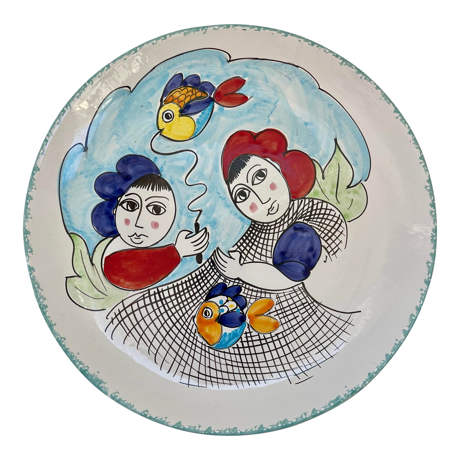 Large Italian Hand-Painted Decorative Hanging Wall Pottery Art Plate: Large vivid hand-painted and hand-made art pottery plate made by skilled artisans in Italy. The platter depicts two woman fishing with a net with colorful fish motifs. Marked on the back with "Desuir 