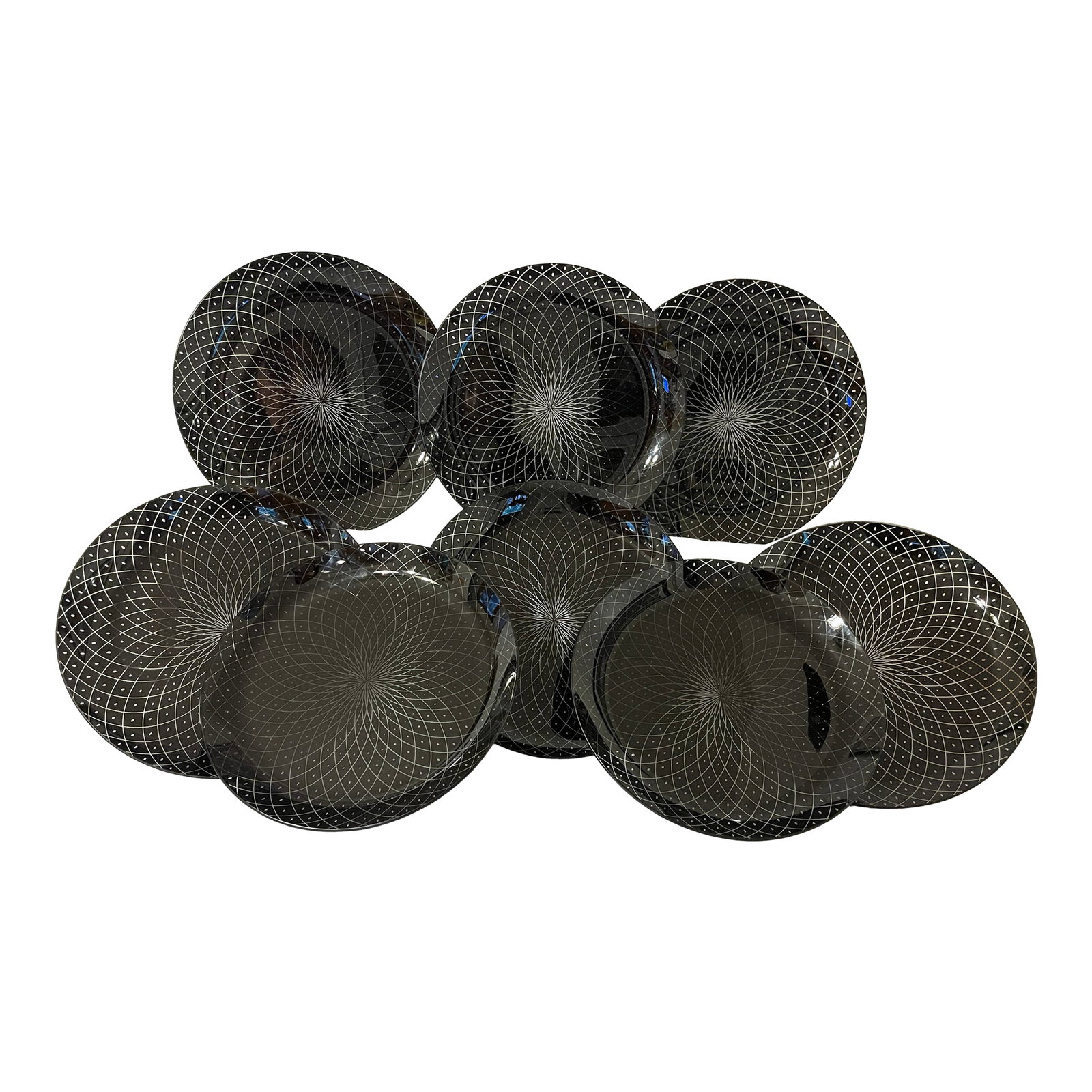 Vintage Black Glass Plates- Set of 8: Beautiful and unusual set of 8 vintage glass dinner plates or chargers with a complex spirograph pattern that starts as a flower in the center then spirals out to the edges, with a circle of dots