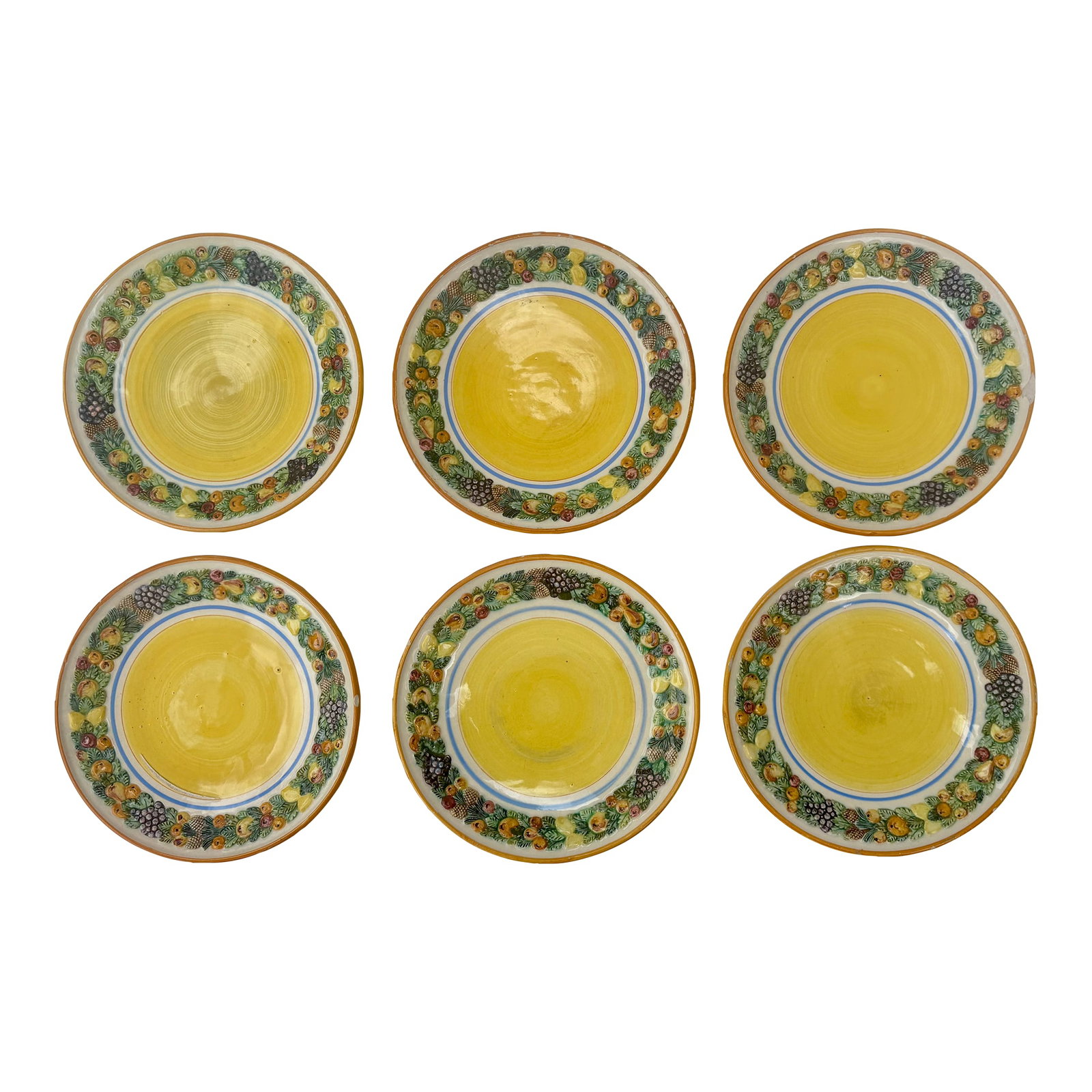 1950's Italian Majolica Fruit Border Yellow Salad Plates in the Style of Dellarobbia- Set of 6: Set of six vintage Italian Majolica pottery plates, likely from the 1950"s, in the style of Dellarobbia, feature a sunshine yellow center with a blue ring, surrounded by raised fruit and foliage