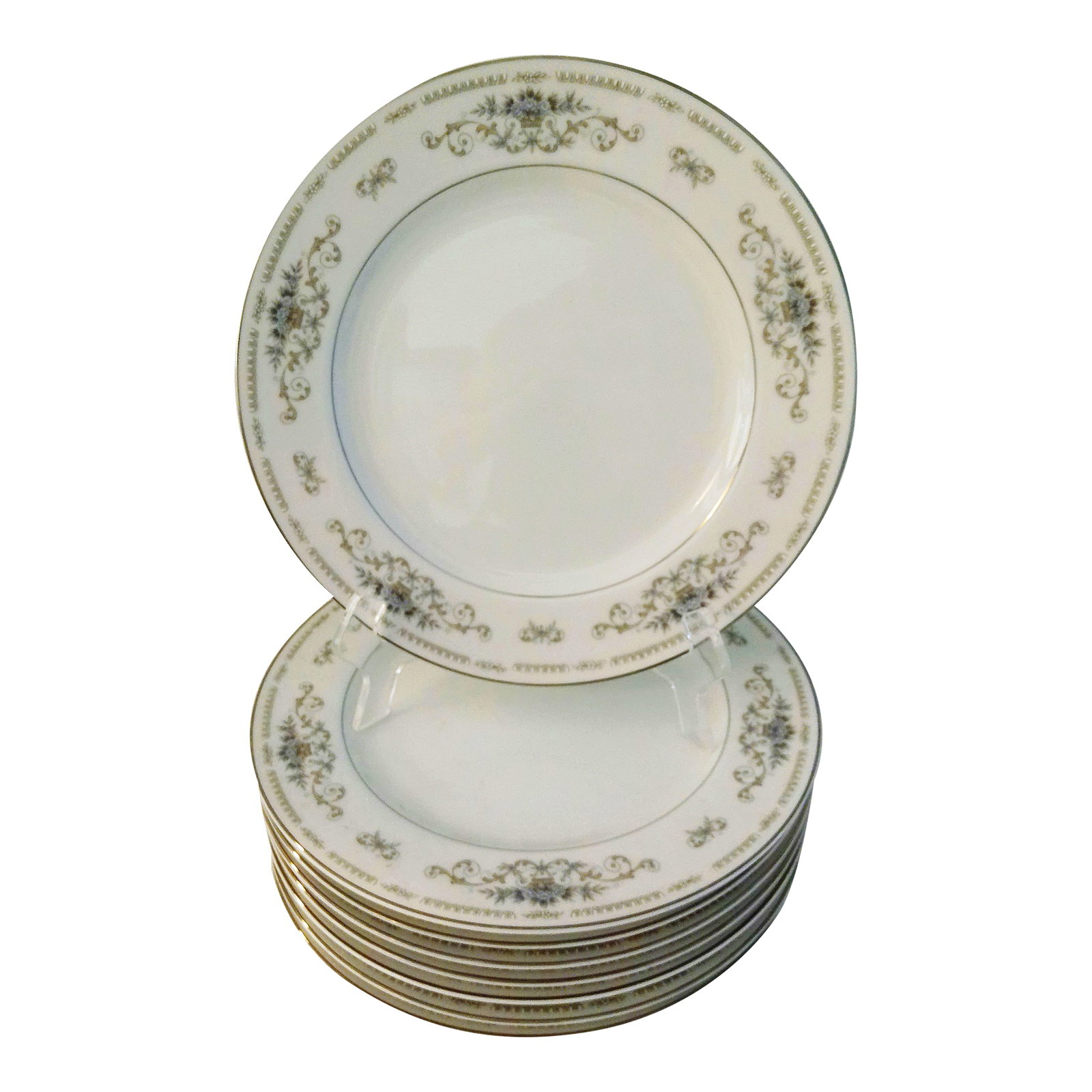 1980s Diane Blue Silver Floral Dinner Plates, Set of 8: Lovely set of eight dinner plates in Wade Fine China's "Diane" pattern. White porcelain china featuring a delicate powder blue and taupe floral pattern with silver rims. Marked underside "Fine