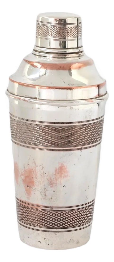 1930s Art Deco Cocktail Shaker: 1930s English Silver-Plate Cocktail Shaker with distinctive wear patterns of Sheffield plate, silver polished down to copper, hinting at a storied past in either a bustling pub or a lively home filled