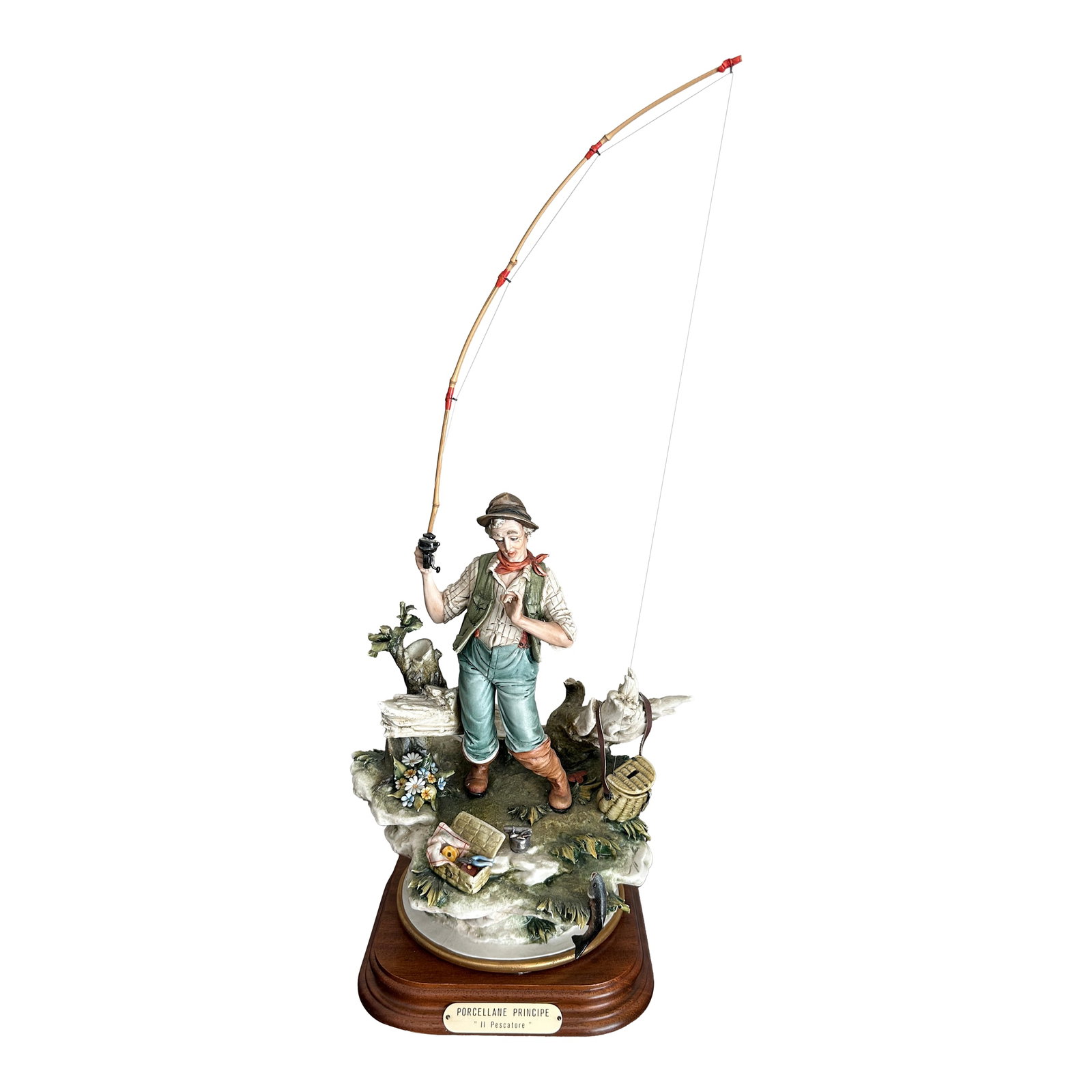 Vintage Capo Di Monte Capodimonte "Il Pescatore" the Fisherman Porcelain Sculpture: Elevate your space with the timeless elegance of the Capo di Monte "Il Pescatore" porcelain sculpture. A true masterpiece, this collectible piece portrays the serene life of a fisherman, complete