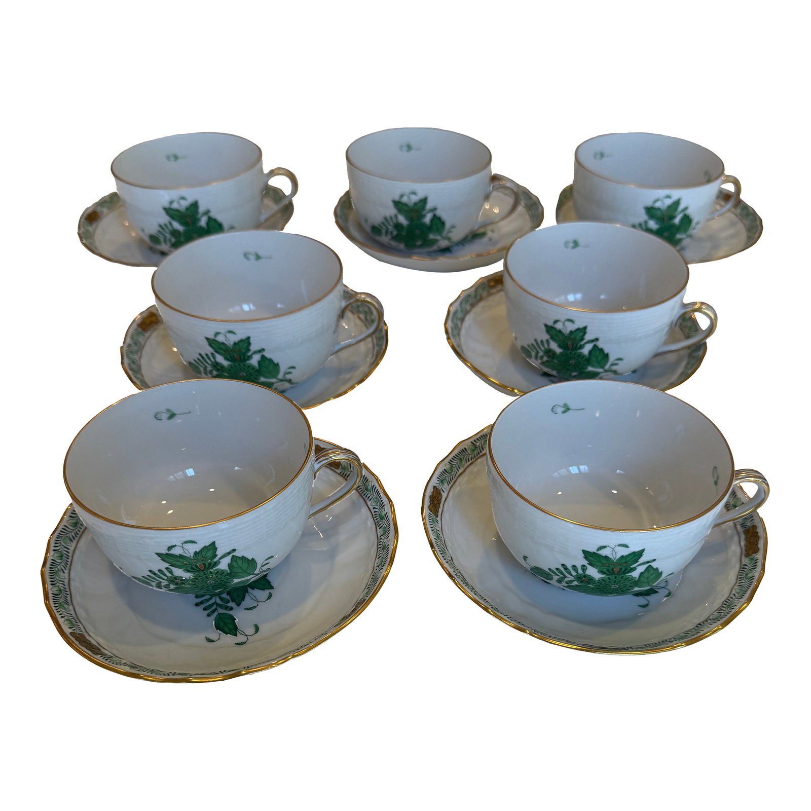 Mid 20th Century Herend Green Chinese Bouquet Tea Cup and Saucer Set- 7 Cups and 7 Saucers: Beautiful hand-painted set of Herend Apponyi green Chinese Bouquet teacups and saucers. Graceful and elegant set in pristine condition. Individually numbered on the bottom/underside of the cup.