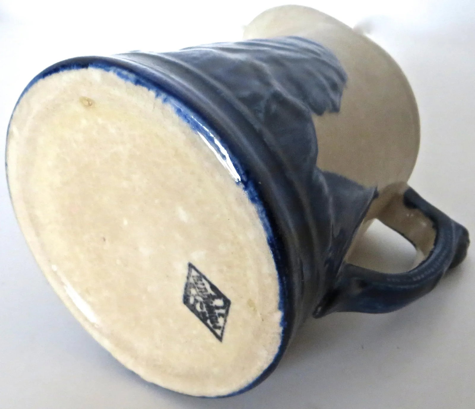 "Sleepy Eye" Complete Set of 5 Stoneware Pitchers, American, Circa 1905 - 17