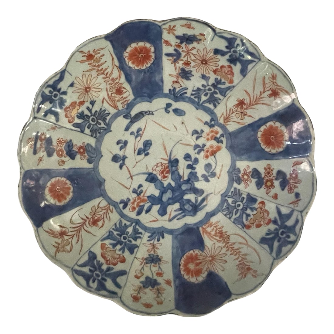 18th Century Chinese Imari Large Dish Kangxi: A good Chinese export dish of moulded Chrysanthemum form decorated in underglaze blue and iron red and gilding. The border divided into a series of sixteen panels containing various floral motifs