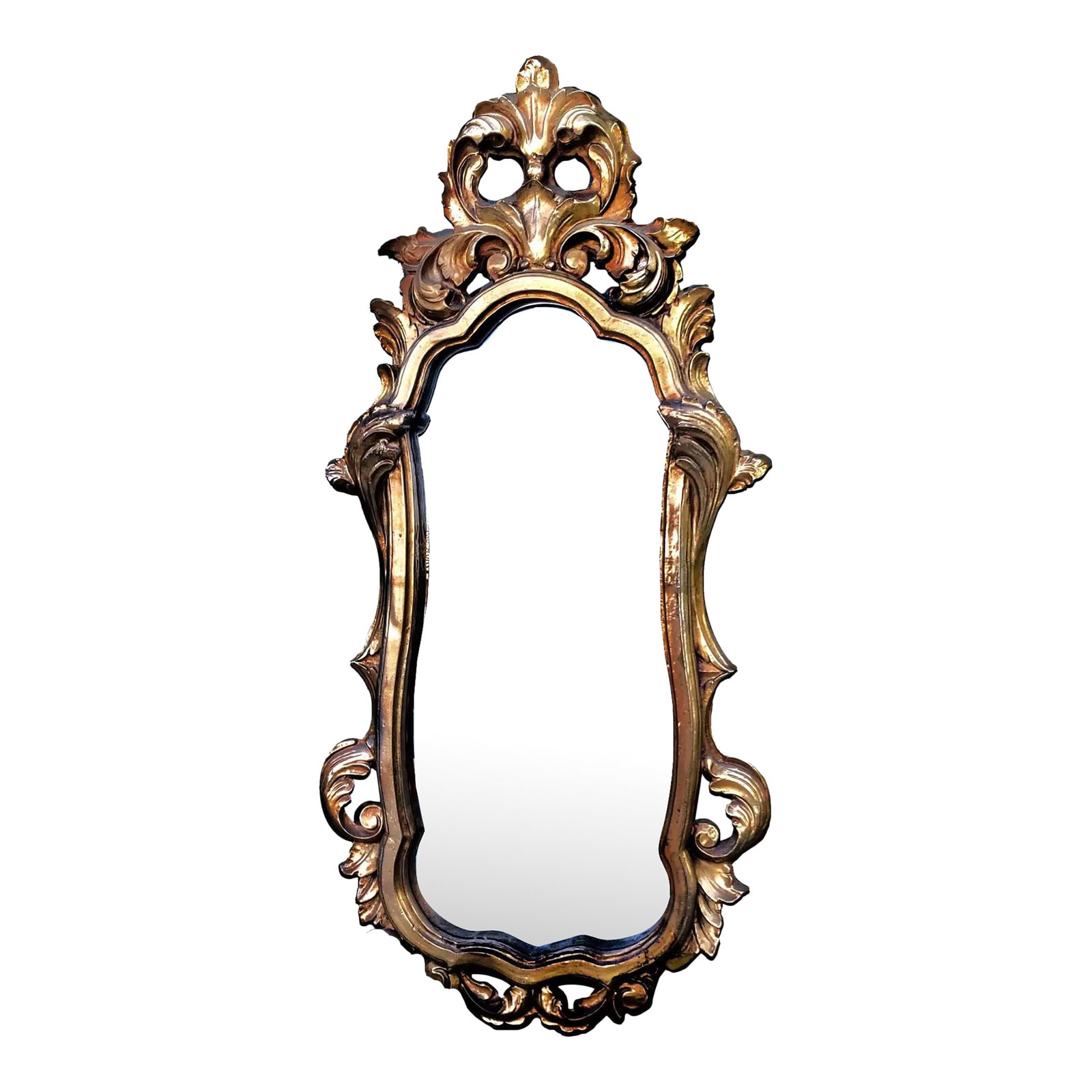 1990s Hollywood Regency Ornate Italian Grand Tour Style Giltwood Mirror: This exquisite full-length wall mirror embodies the opulence and theatrical flair of late Regency Revival design with distinct Grand Tour influences. Crafted in the 1990s, the frame is a masterful