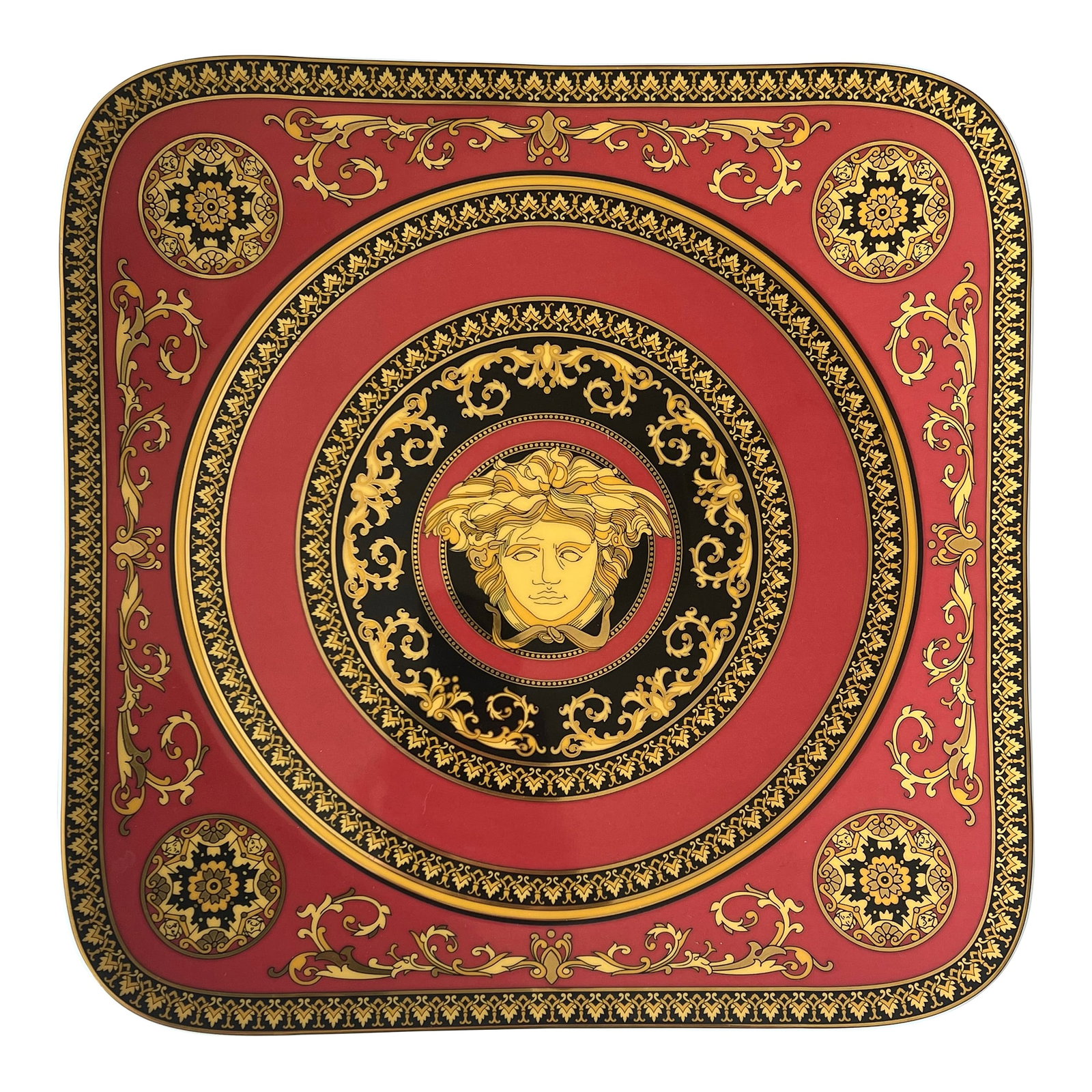1990s Versace Medusa Red by Rosenthal Square Charger Plate: This 13" porcelain charger plate features the Versace Medusa Red design with red and gold and black elements. This generous size and square shape are hard to find. Could be used as a fantastic serving