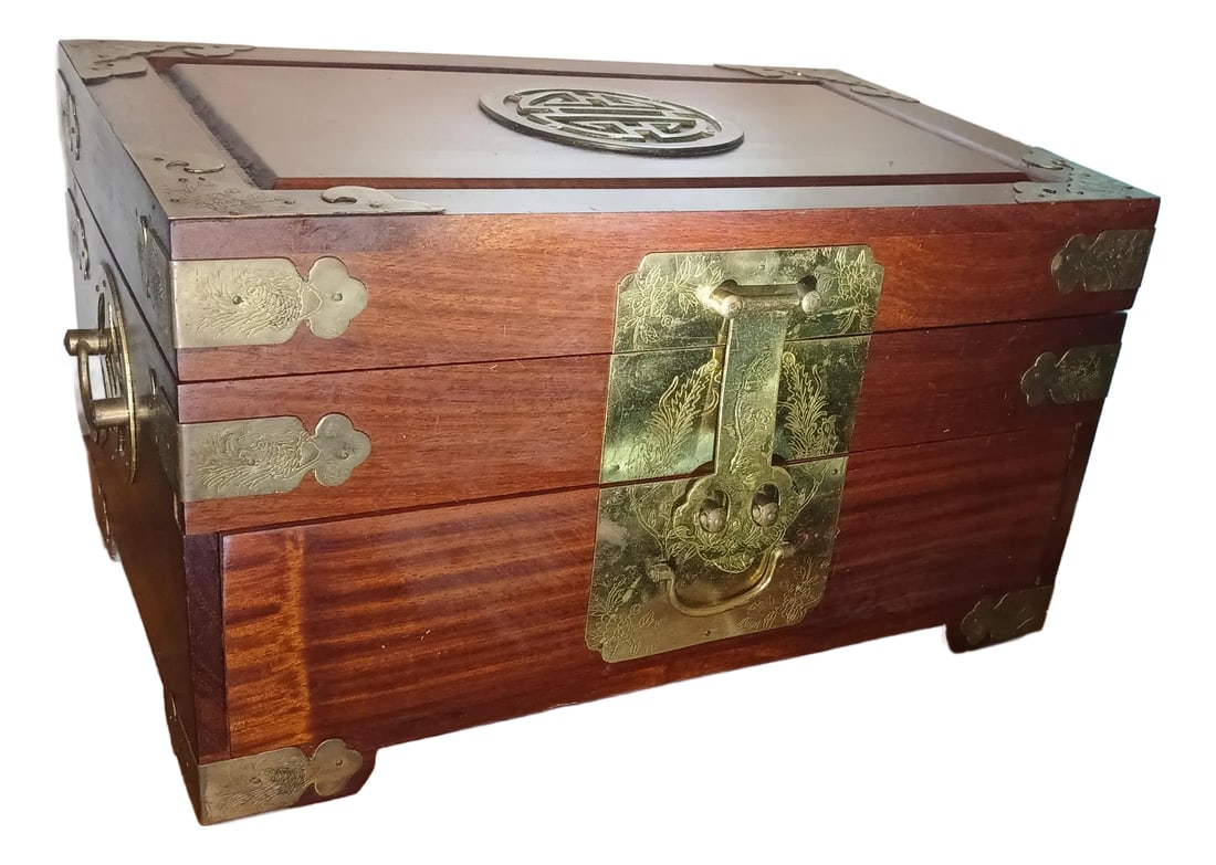 1970s Vintage Rosewood Chinoiserie Brass Accented Jewelry Box Chest: Gorgeous Rosewood and brass jewelry box with two velvet lined drawers. Beautiful vintage condition. Made in Hong Kong in the 1970s. Medallion decoration on top. Condition: Alterations: Original