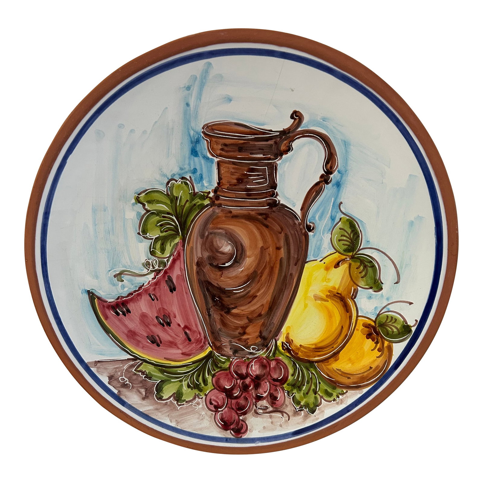 Vintage Large Pitcher & Fruit Italian Pottery Bowl: Colorful large vintage Italian pottery bowl featuring a hand-painted pitcher and fruit motif on face. Interior bowl is glazed to protect paint. Holes on back should prefer to display hanging.