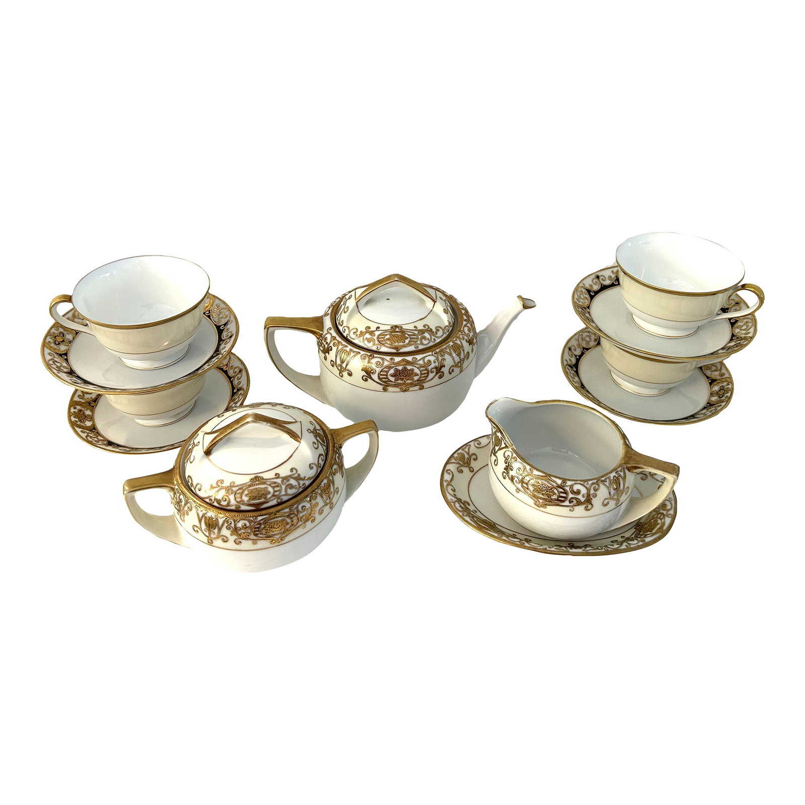 Mid-Century Noritake 24k Tea Set, Service for 4: Exquisite mid-century Noritake Japan porcelain nicely matched tea set in two patterns. Set features, one lidded teapot, (8.5"L x 4.75"W x 5"H), one lidded sugar bowl, (6.5"L x 4"W x 4.25"H), one