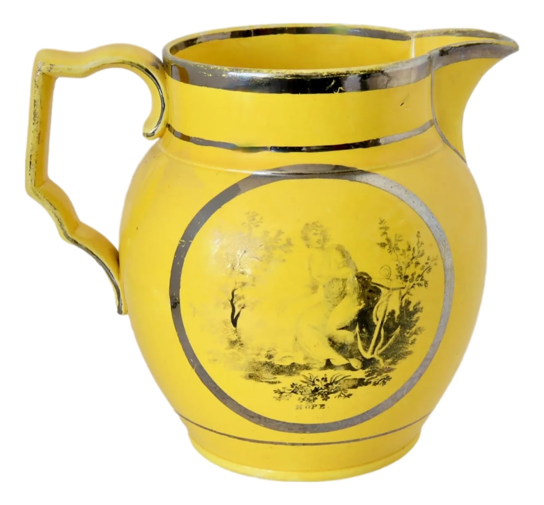 Circa 1810 Canary Yellow Hope & Charity Jug: Rare early 19th-century canary yellow lusterware jug with silver resist trim, featuring transfer prints of "Hope" and "Charity." These symbolic bat prints were popular c.1810, often unmarked as seen