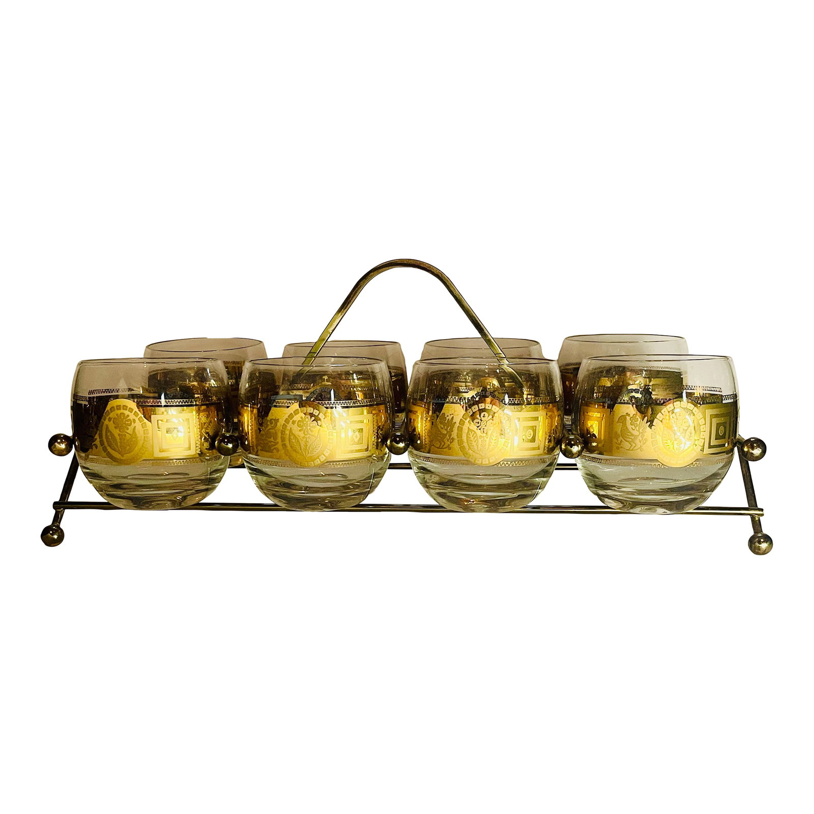 Mid 20th Century Culver "Coronet" 22k Roly Poly Glasses and Caddy - 9 Pieces: A set of eight gold banded lowball glasses decorated with stylized birds & flowers paired with an atomic minimal gold tone caddy. -Caddy measures 14 inches long, 6 inches wide and 6 inches tall.