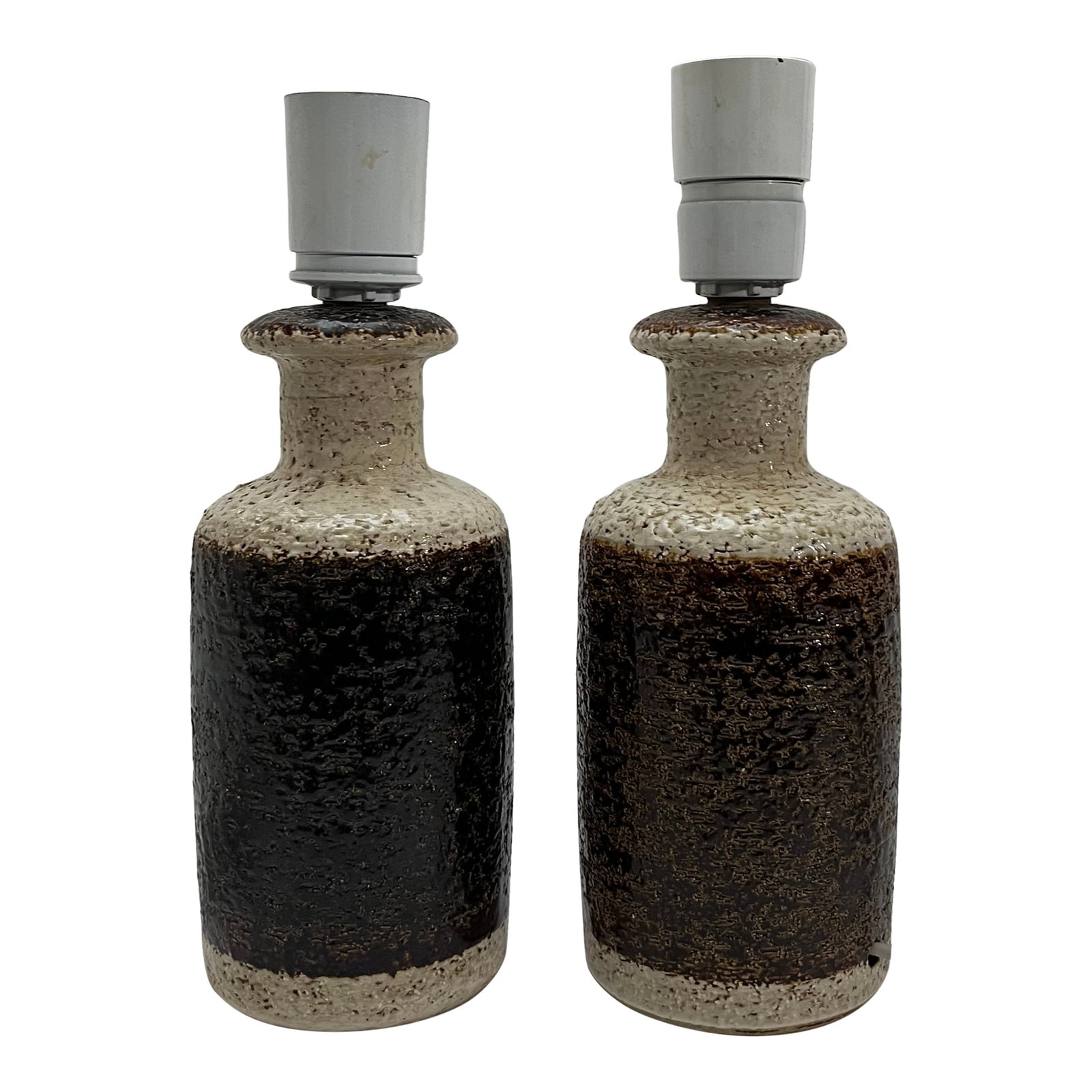 A Pair Danish Modern Brown, Cream Table Lamp by Jensen for Soholm: This pair of beautiful rustic Scandinavian Mid-Century Modern handmade table lamps by ceramicist Svend Aage Jensen for acclaimed Danish ceramic company Soholm. Chamotte clay with shiny chocolate