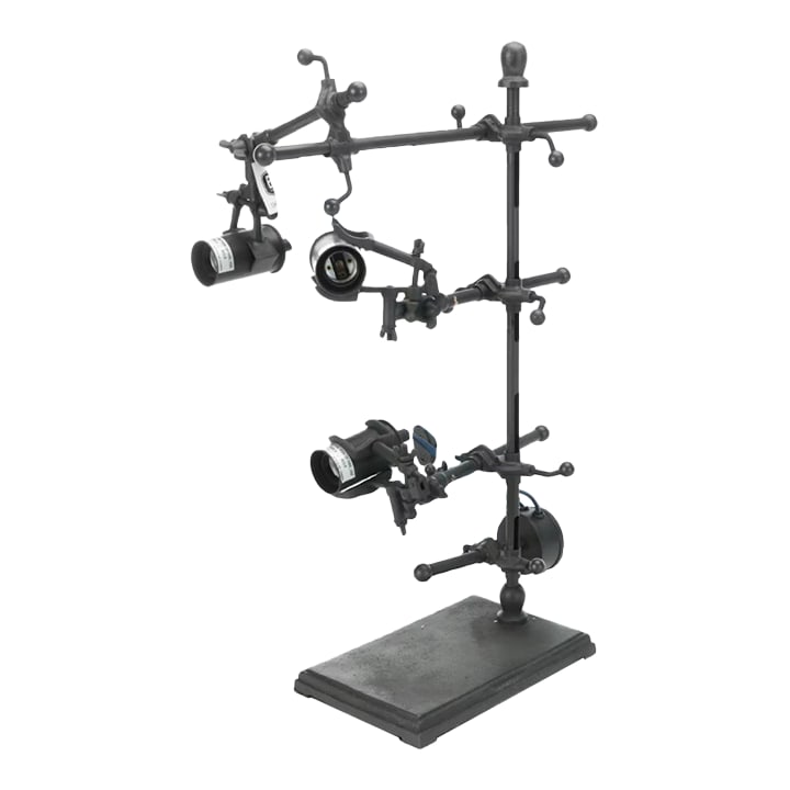 Bobo Intriguing Objects Emmet Industrial Adjustable Clip Lamp: This Emmet Adjustable Clip Lamp combines industrial and steampunk charm. It features adjustable arms, exposed lightbulbs, and blue electrical cords that create a lighted sculpture. It's ideal for a
