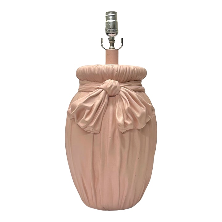 Faux Bow Pink Plaster Table Lamp Attributed to John Dickinson, 1970s: This is a stunning 1970s blush pink plaster table lamp, attributed to John Dickson. It features an elegant faux bow and draped fabric detailing, adding a sculptural and romantic touch. Measurements: