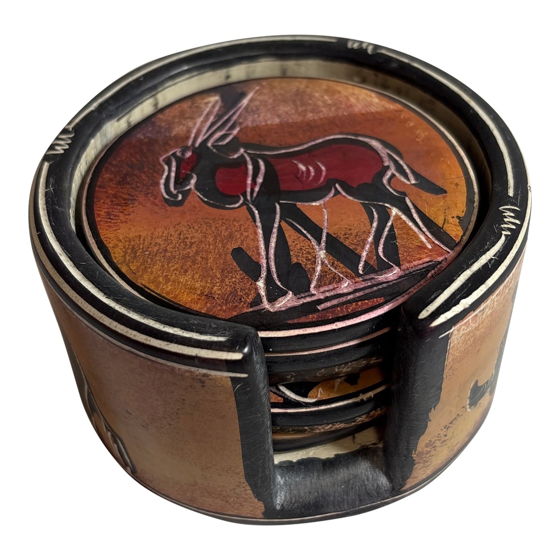 African Clay Sculpted Heavy Coaster Set Illustrating Various African Animal.: Each of these six coaster has an animal illustrated on the top of the clay coaster including Gazelle, Giraffe, Lion, Zebra, Hippo, and Rhino. These were picked up by a friend who does charity work in